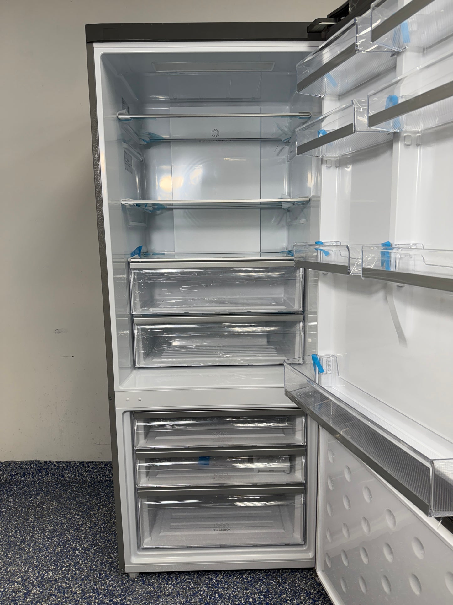 HRB15N3BGS | 15 Cu.Ft. HAEIR Bottom Freezer Refrigerator with Reversible Door, Multi Zone Air Tower, and LED Lighting at the Best Scratch and Dent Appliance Store in Kansas City Metro
