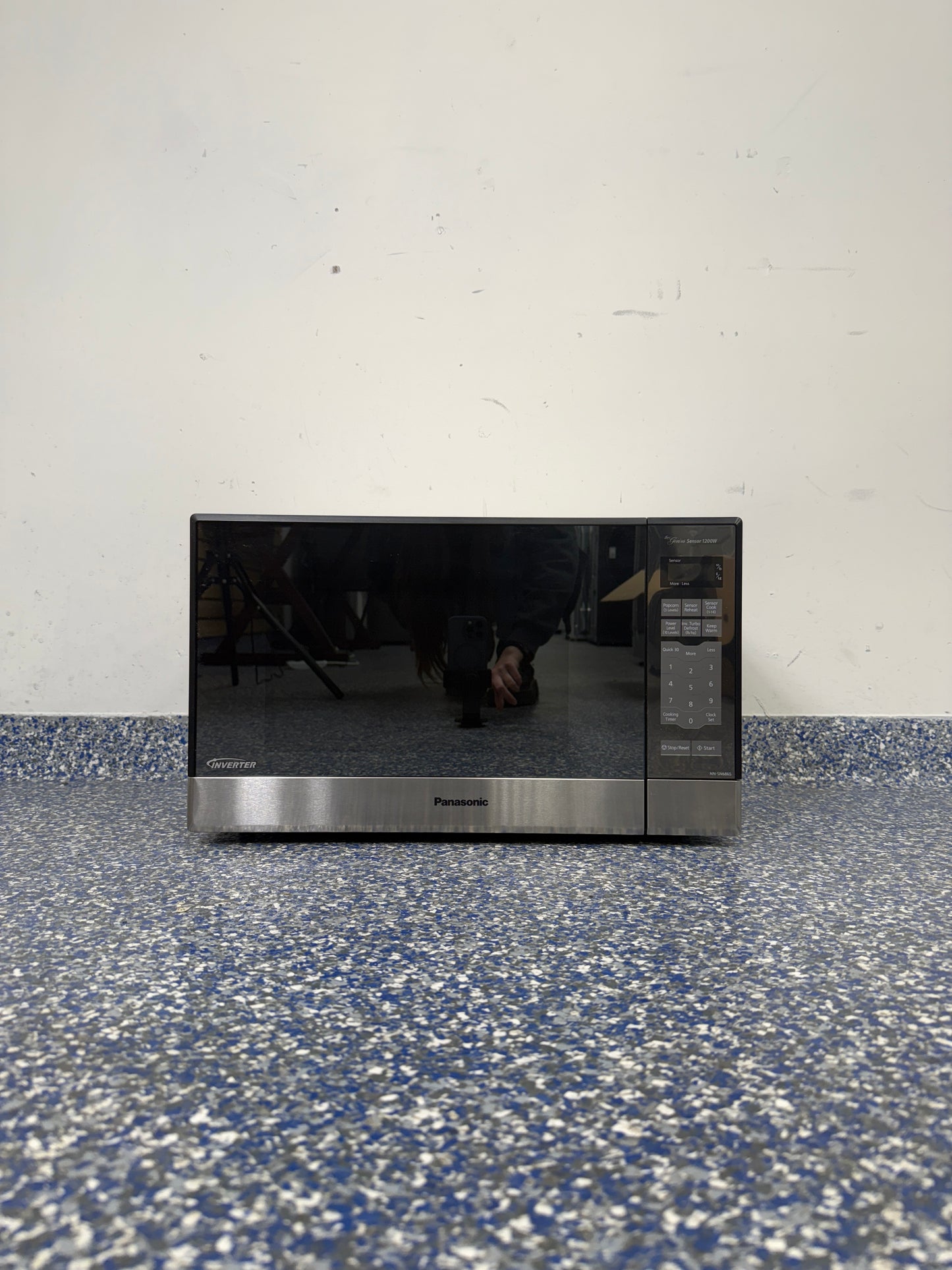 1.2 Cu.Ft PANASONIC Microwave with Fingerprint Resistant Stainless Steel Exterior and Black Frame at Appliance Shark Discount Appliance Store in Overland Park Kansas