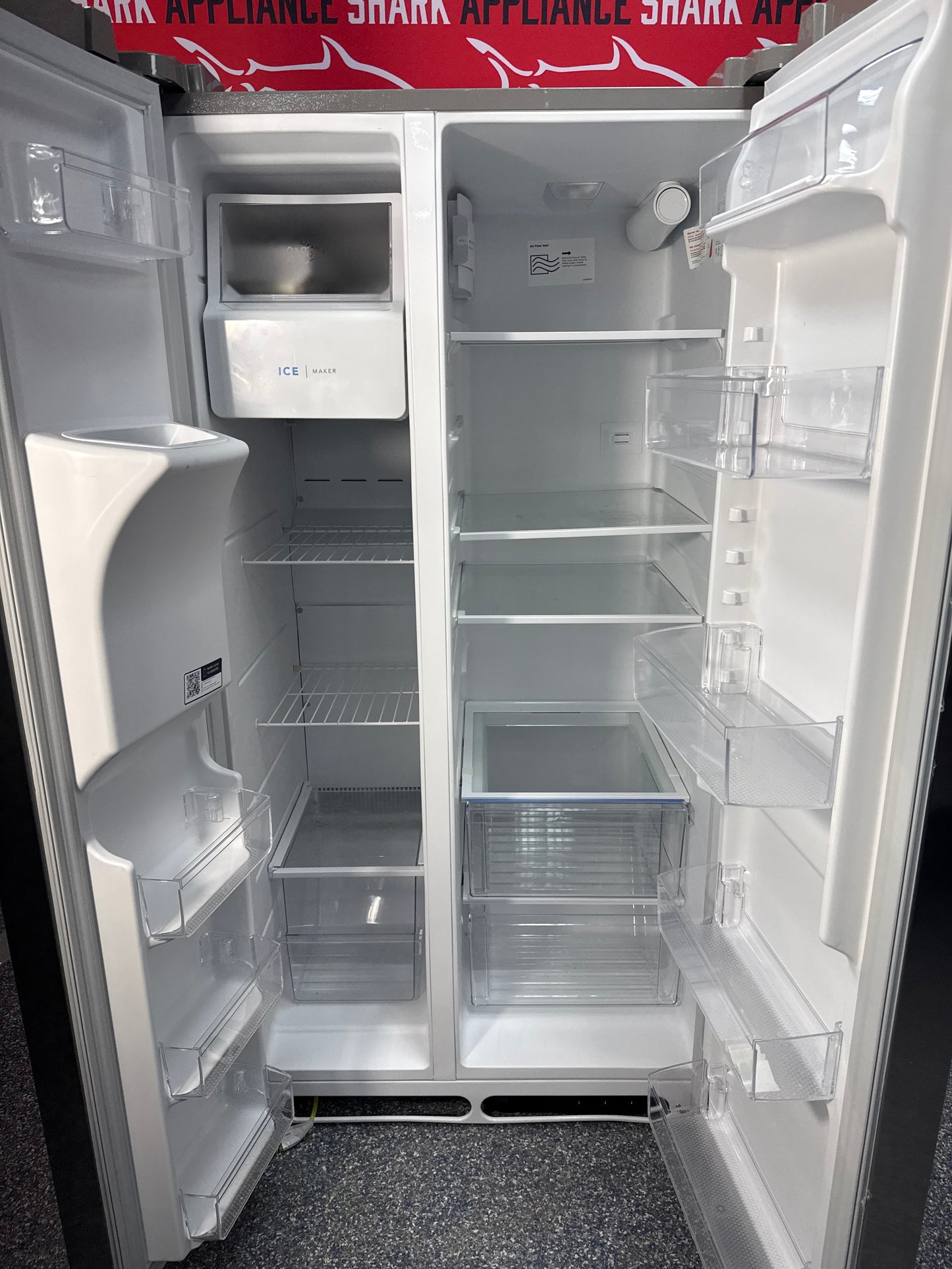 Scratch-dent FRIGIDAIRE side-by-side refrigerator at Appliance Shark. Kansas City's best appliance store.