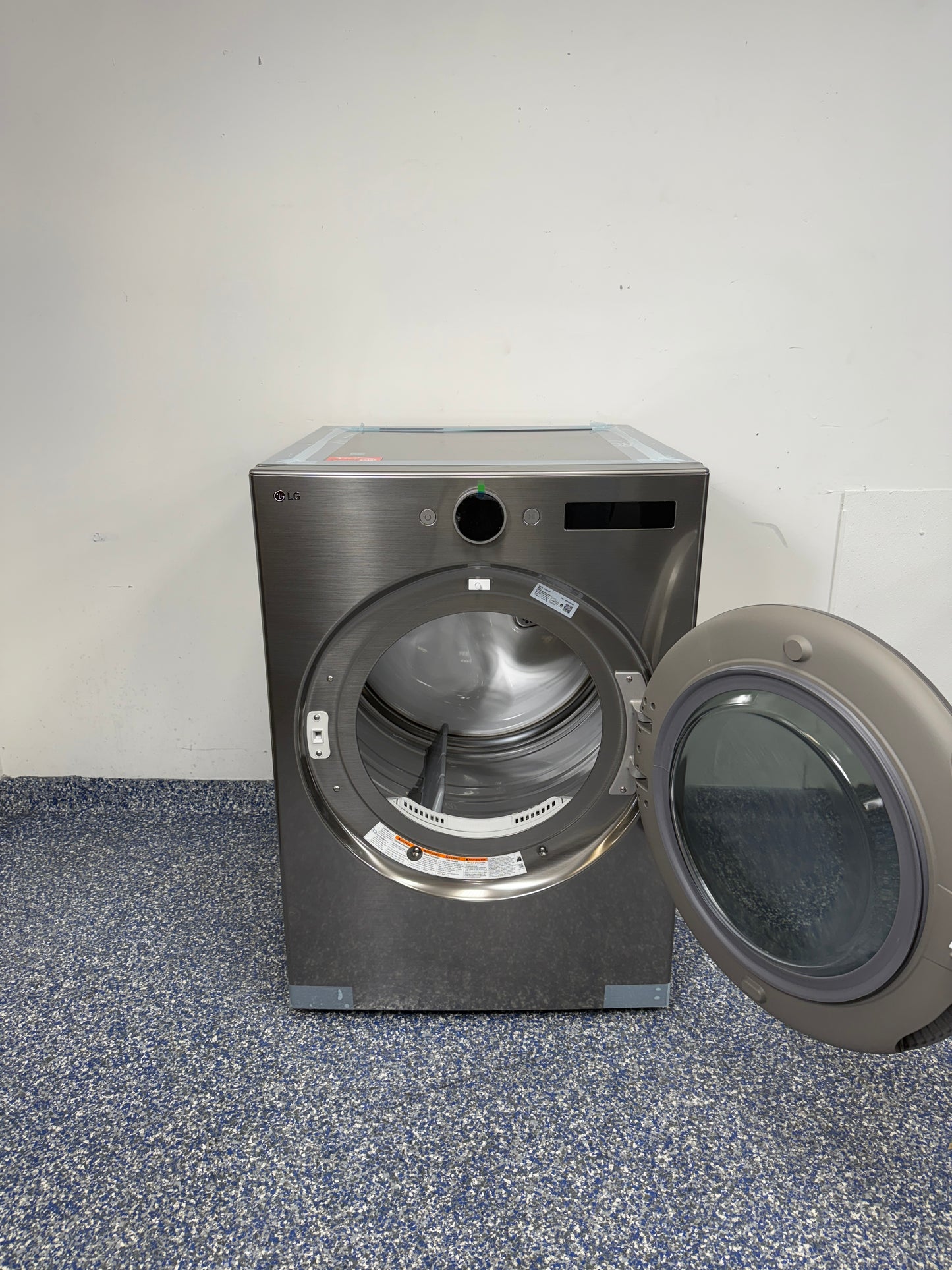 DLGX5501V | 7.4 Cu.Ft. LG Stackable Smart Gas Dryer with AI Fabric Sensor & AI Sensor Dry, Interior Light, Tempered Glass Reversible Door, Propane Convertible, and Stainless Steel Drum at Appliance Shark Scratch and Dent Store in Overland Park, Kansas