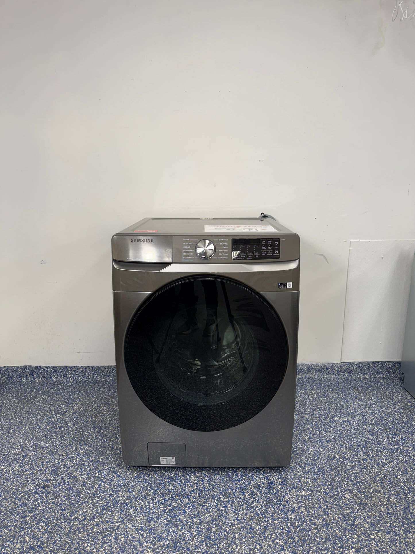 4.5 Cu.Ft. SAMSUNG High-Efficiency Stackable Smart Front Load Washing Machine with 12 Cycles, Including Steam and Super Speed Wash, Antimicrobial Protection, and Self Clean+ at the Best Discount Appliance Store in the KC Area