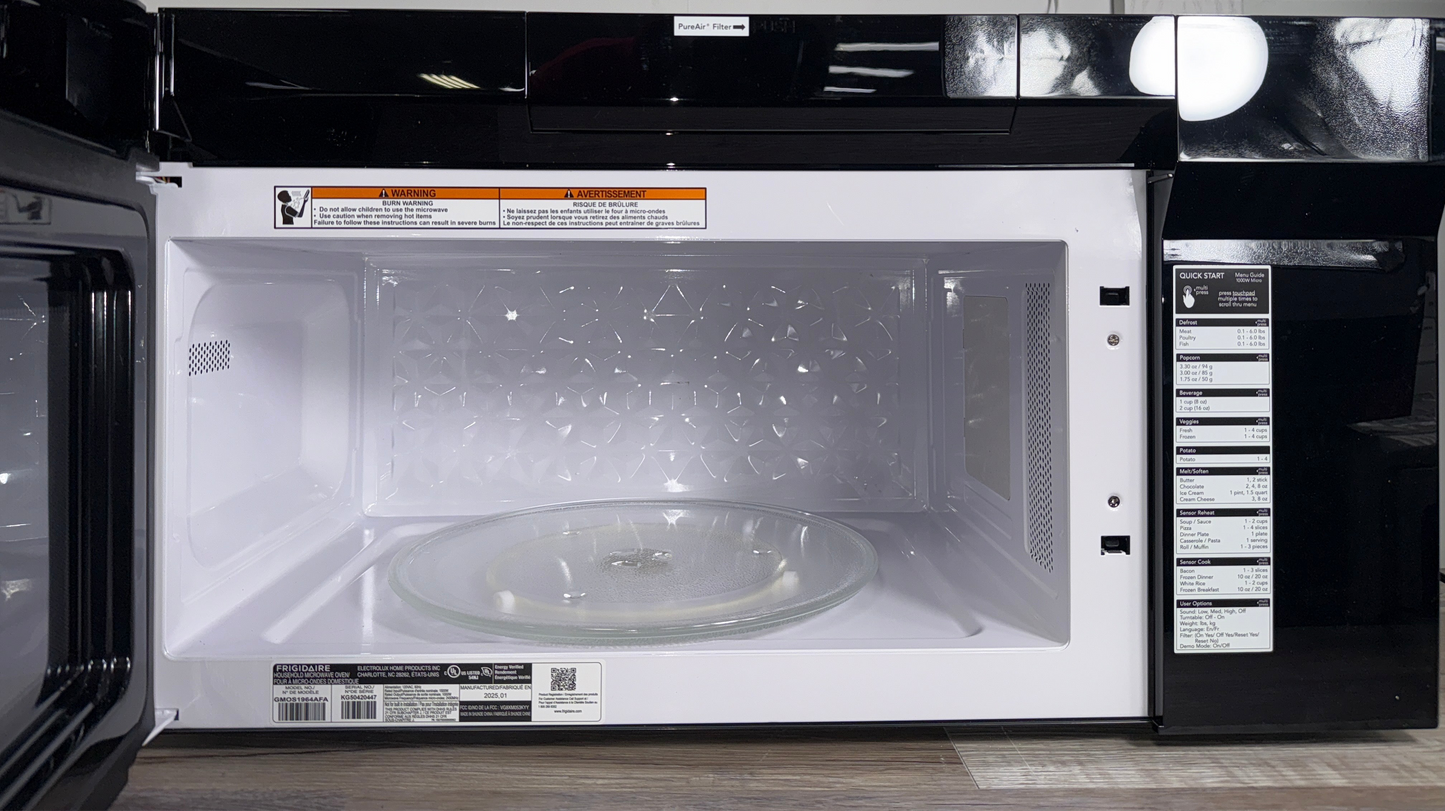 Scratch & dent FRIGIDAIRE Gallery GMOS1964AF microwave displayed at Appliance Shark in Overland Park with smudge-proof stainless steel design.
