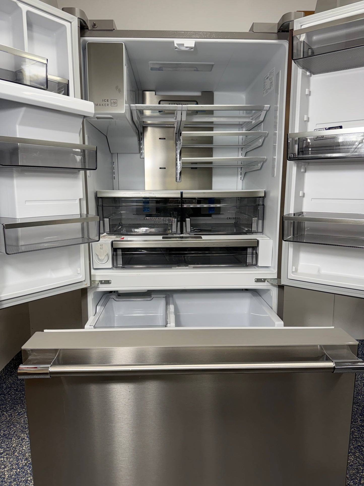 An overhead shot of the FRIGIDAIRE PRFS2883AF with both French doors open, showcasing the flexible SpaceWise® Organization System and LED lighting. On sale at Appliance Shark - Scratch & Dent store | Kansas City.