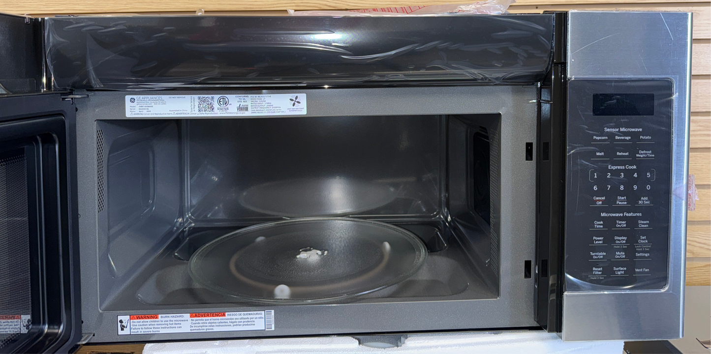Interior of GE JVM7195SKSS microwave showing spacious 1.9 cu. ft. capacity, available as a scratch and dent deal in Kansas City.