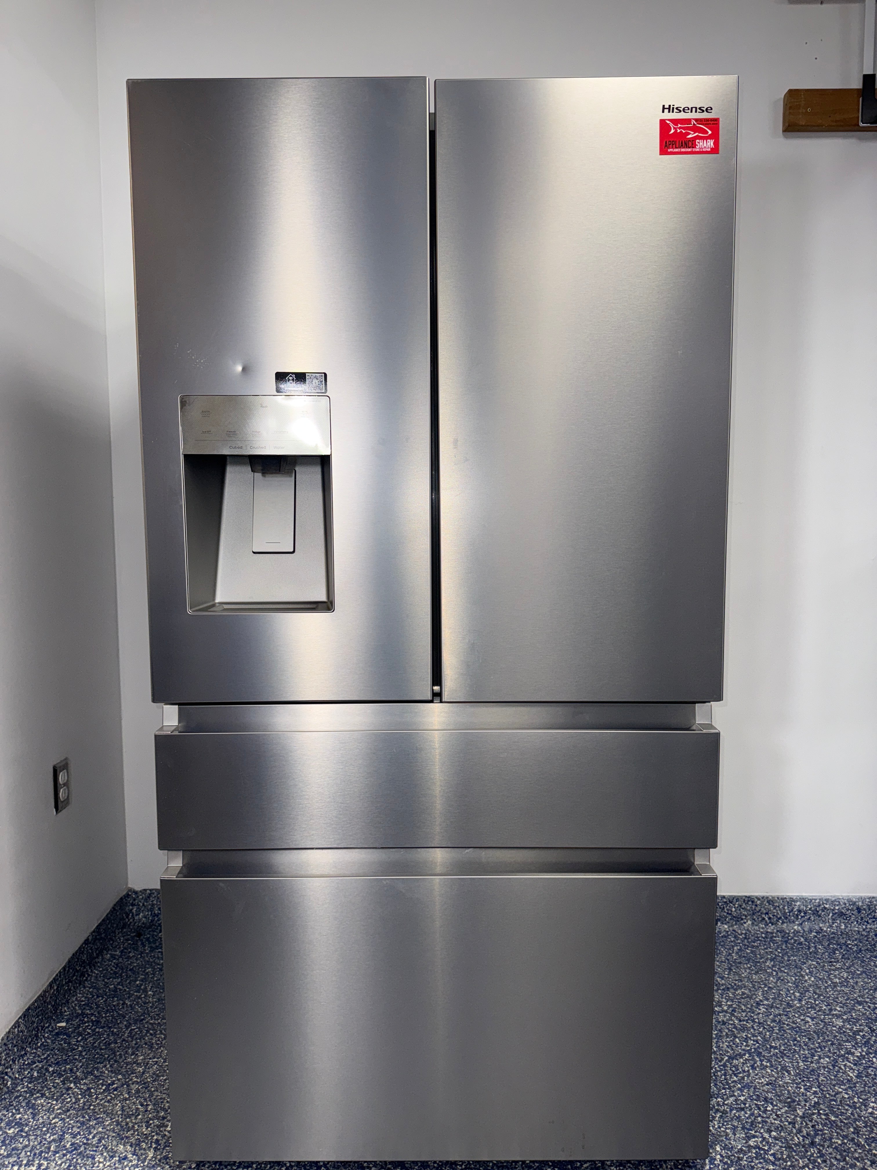 A front view of the HISENSE HRM260N6TSE French door refrigerator, highlighting its exterior and a great deal in Kansas.