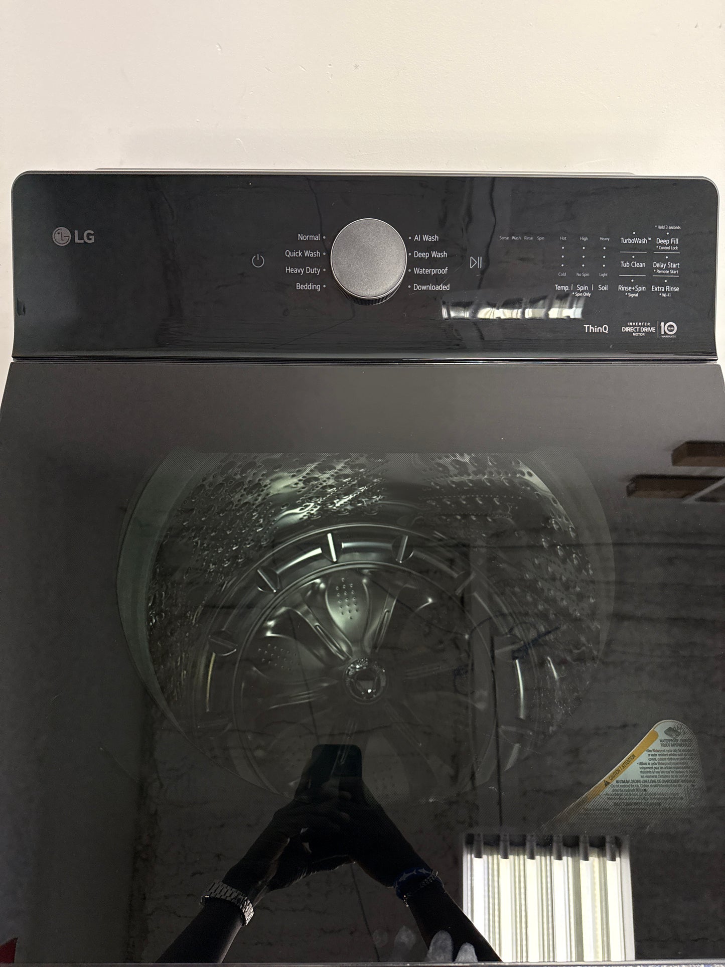 The LG 5.5 cu. ft. top load washer, model WT8400CB, featuring the Deep Fill option, available at Appliance Shark.