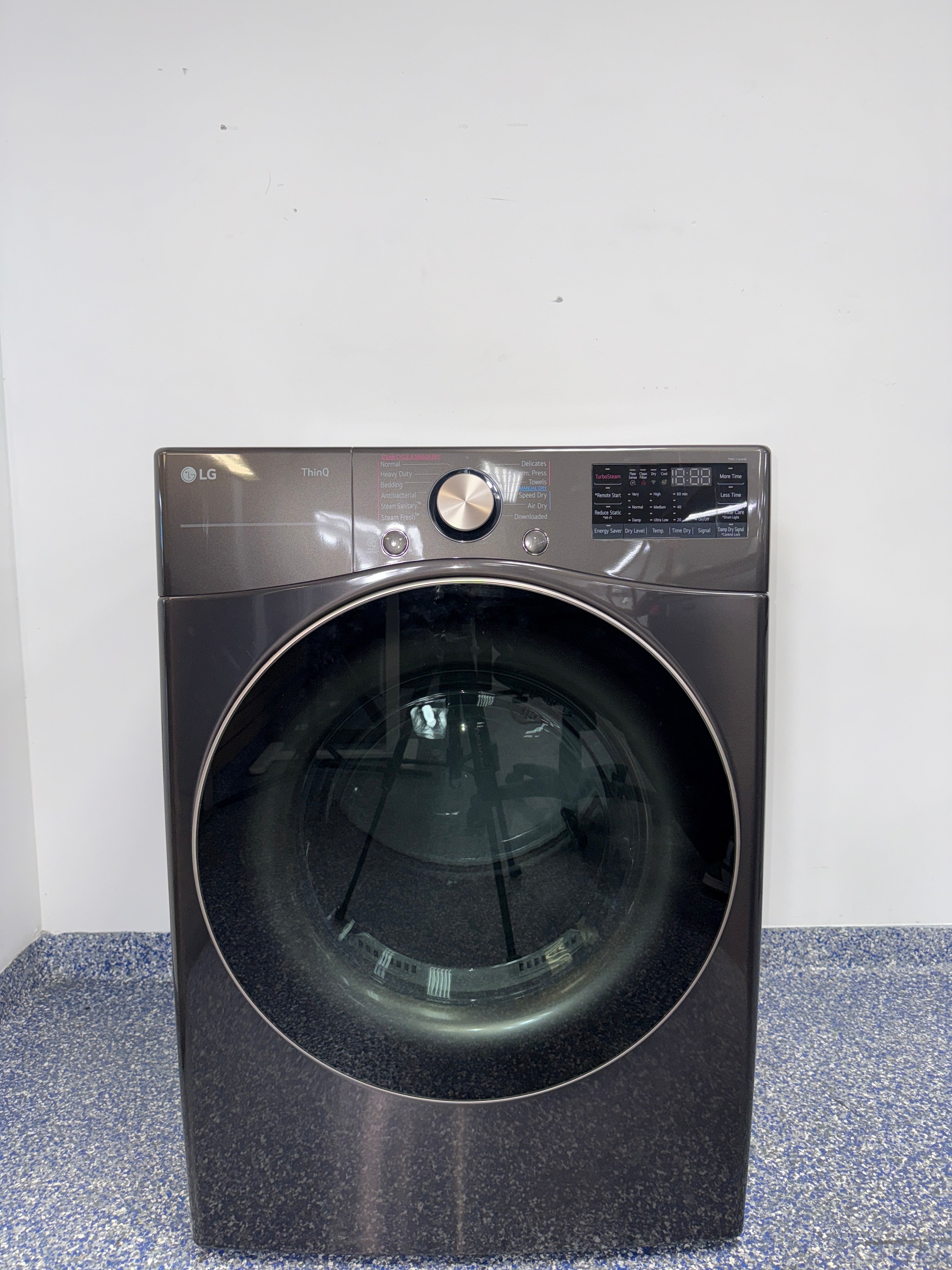 The LG DLEX4000B electric dryer from the front, highlighting its TurboSteam™ feature and a great deal in Kansas.