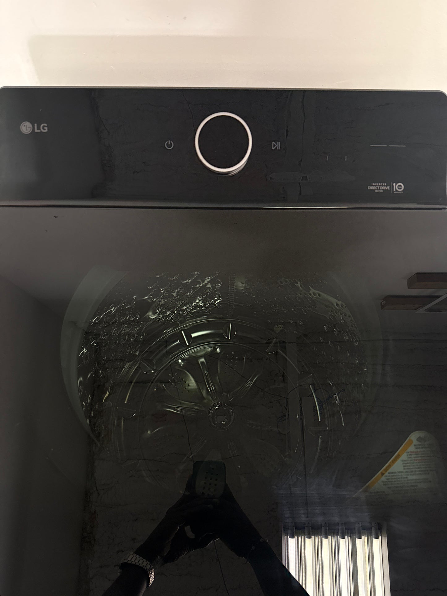 A close-up view of the ezDispense® Automatic Dispenser feature on the LG WT8600CB washer, perfect for an Overland Park, KS home.