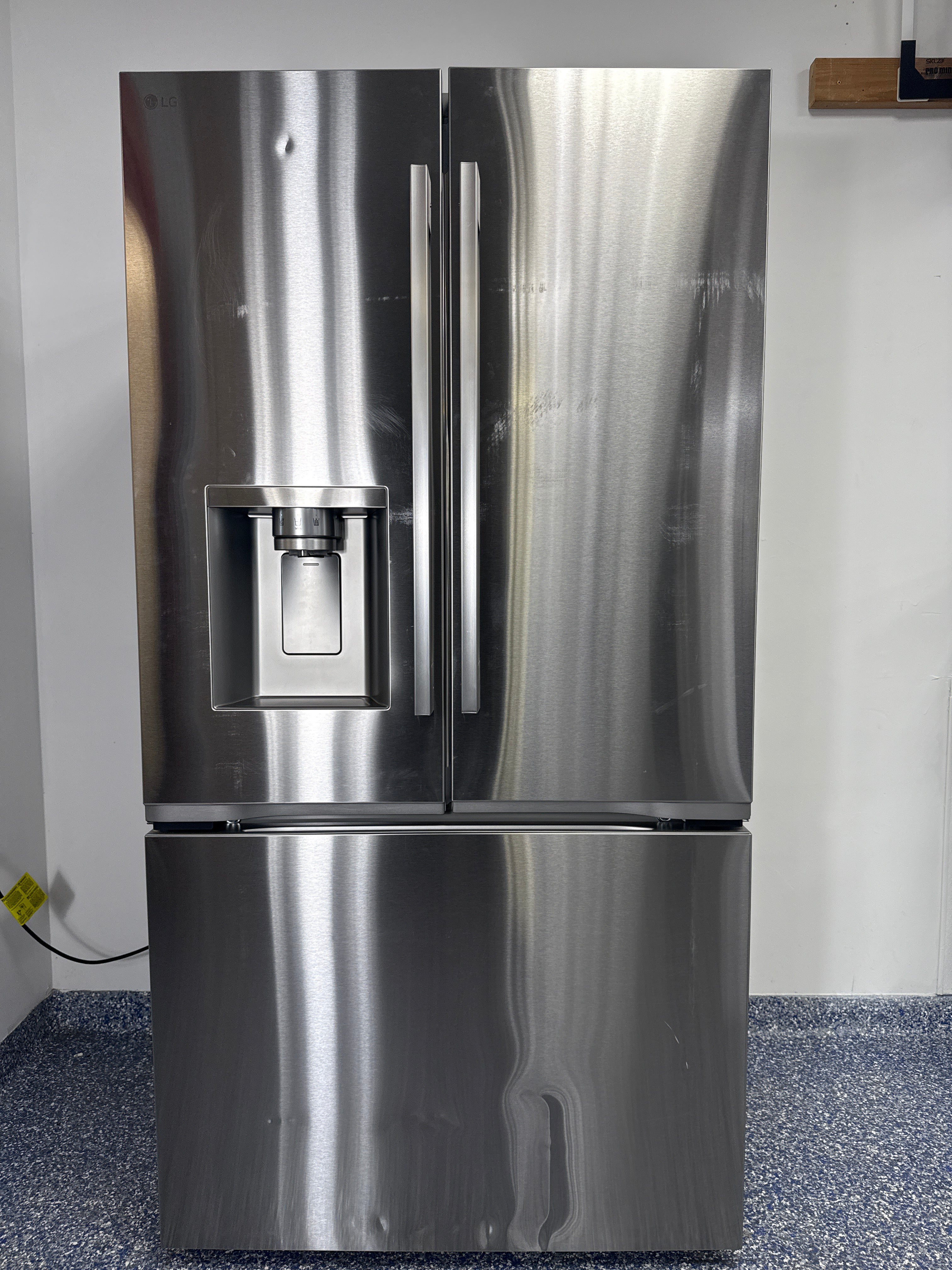 The LG LF24Z6530S refrigerator from the front, a counter-depth French door model with the Craft Iceâ„¢ feature, for a great deal in Kansas.
