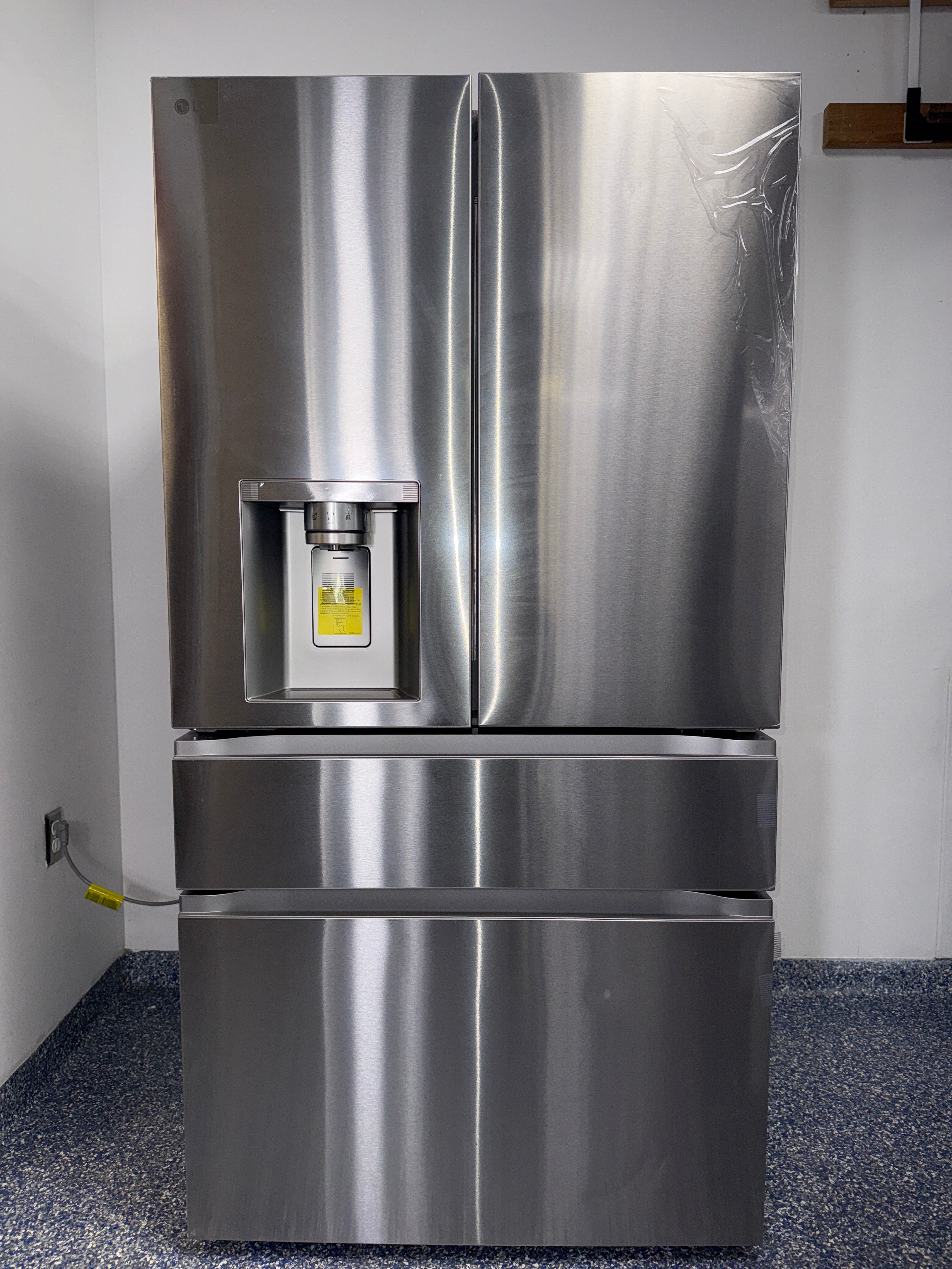 The LG LF29S8330S refrigerator from the front, highlighting its Full-Convert™ Drawer and a great deal in Kansas.
