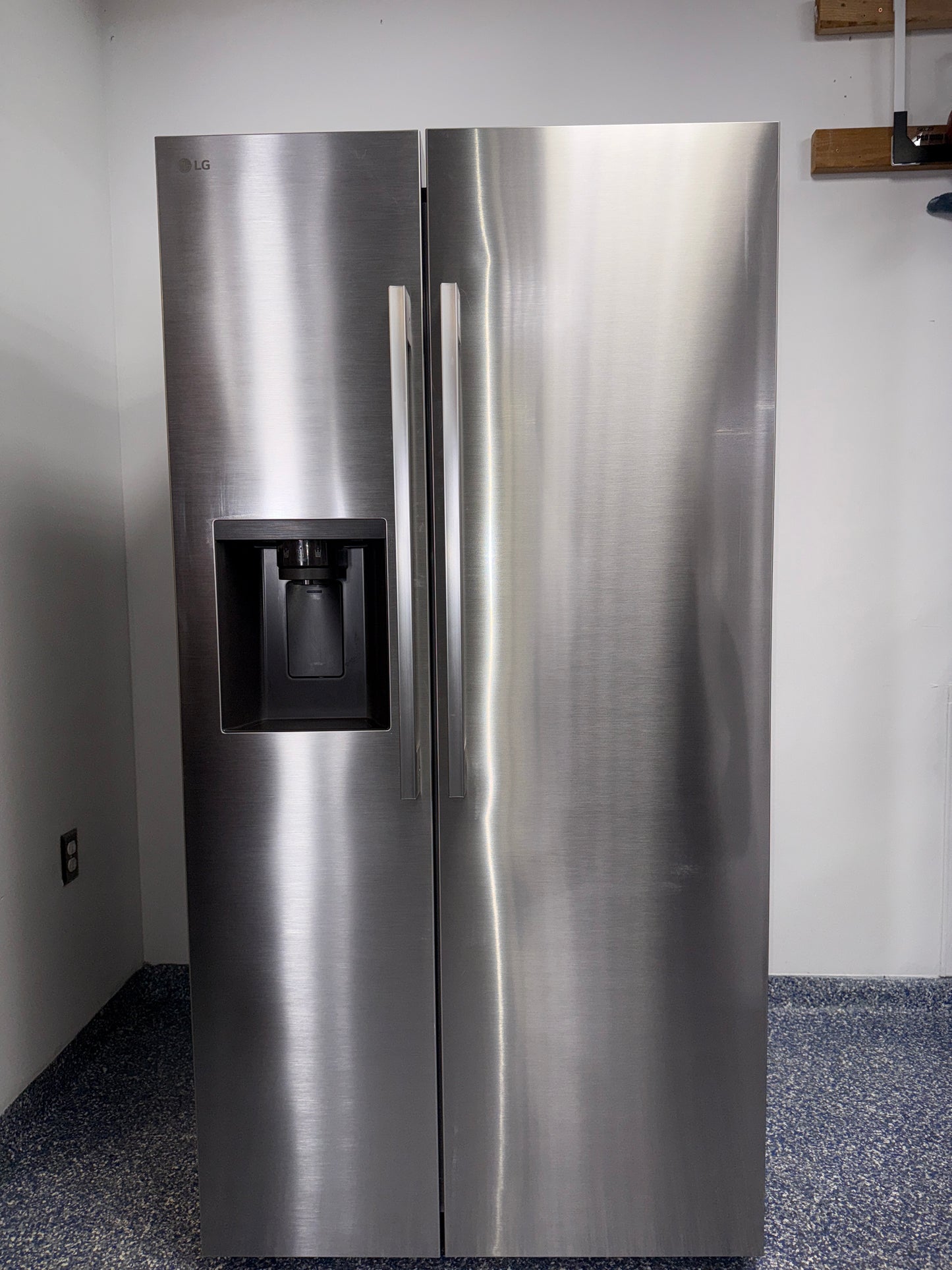 The LG LS27T3230S refrigerator from the front, a side-by-side model for a great deal in Kansas.