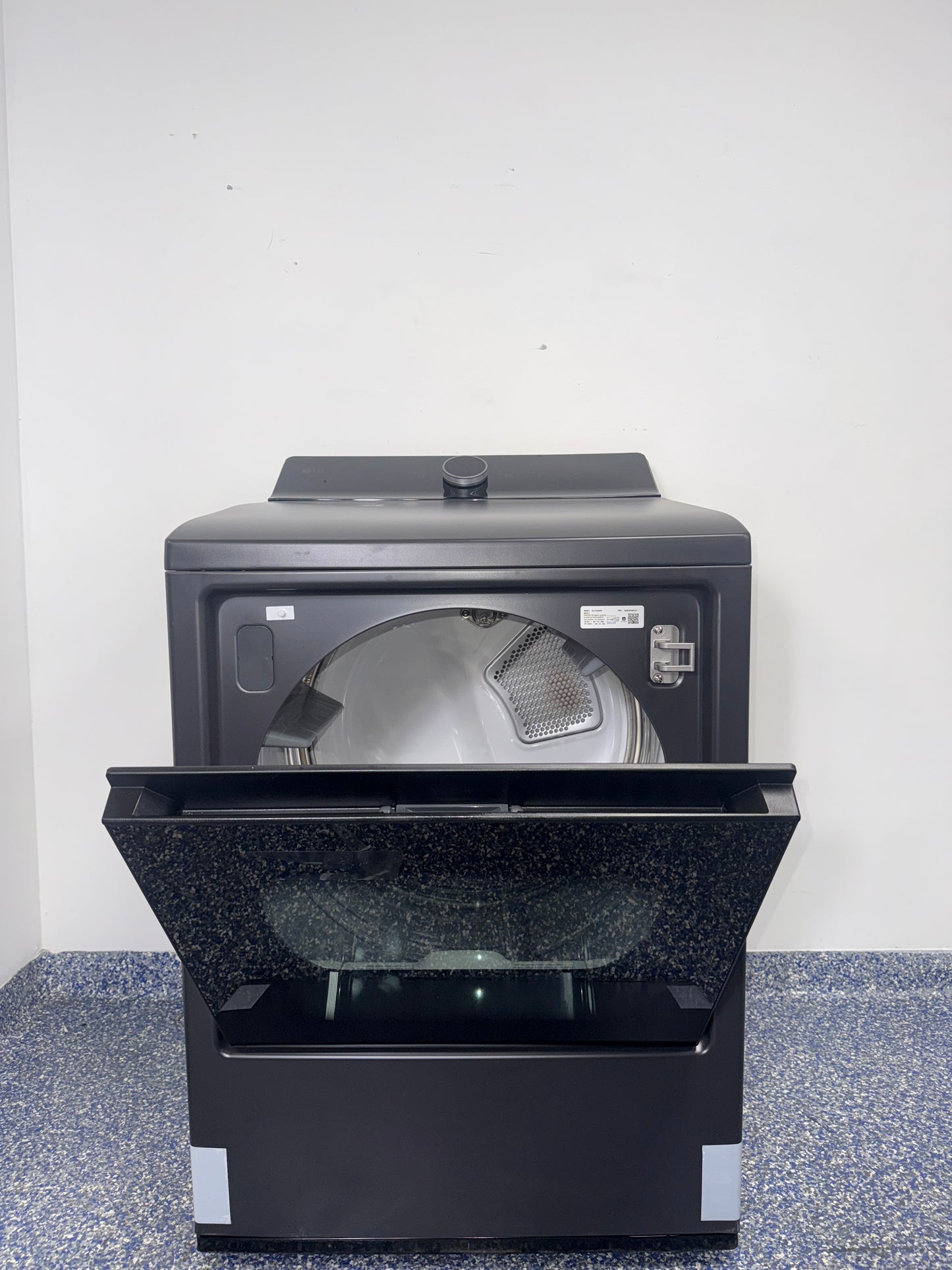 A close-up view of the control panel on the LG DLEX8600BE dryer, showcasing TurboSteamâ„¢ and AI Sensor Dry, perfect for an Overland Park, KS home.