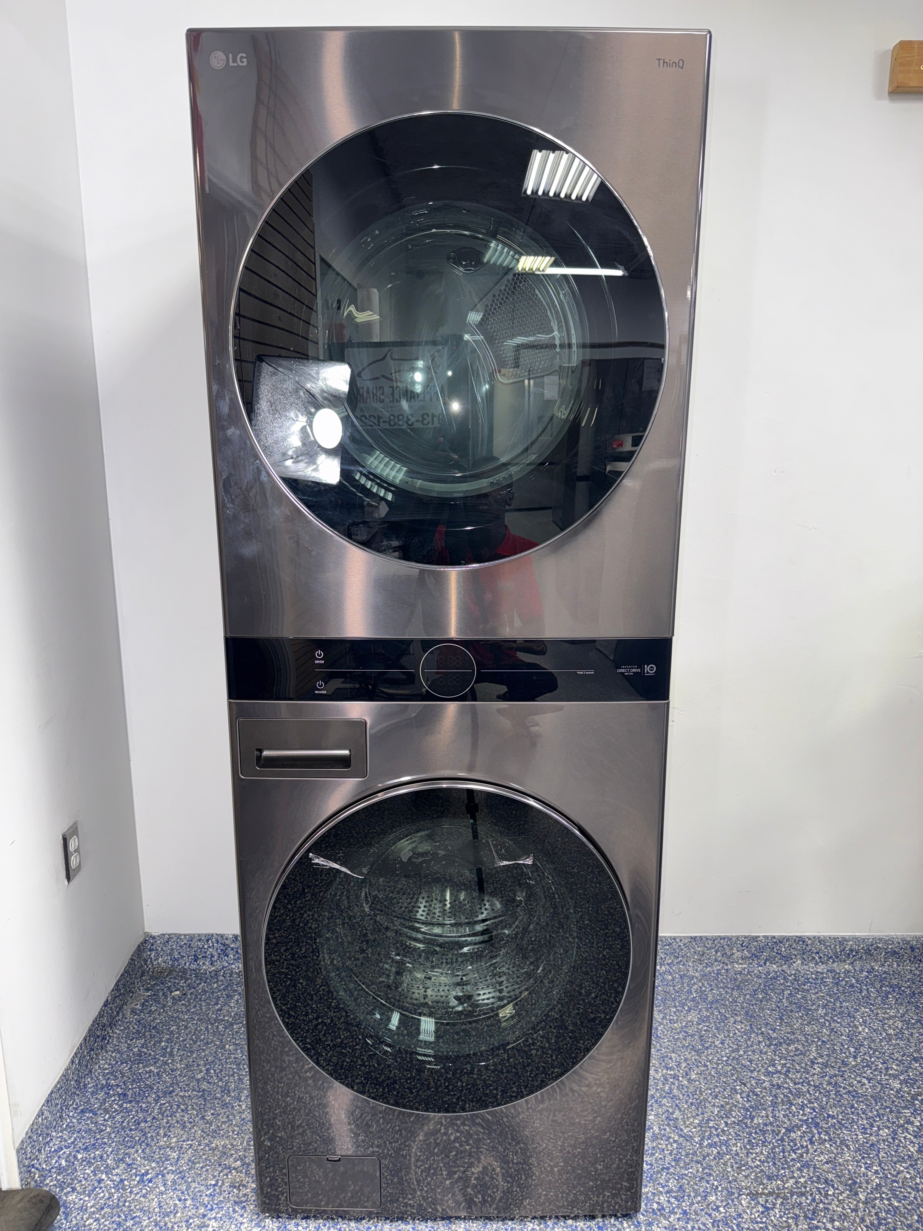 A close-up view of the drum interiors on the LG WKEX200HBA, showing the TurboWash™ 360° and TurboSteam™ features, perfect for an Overland Park, KS home.