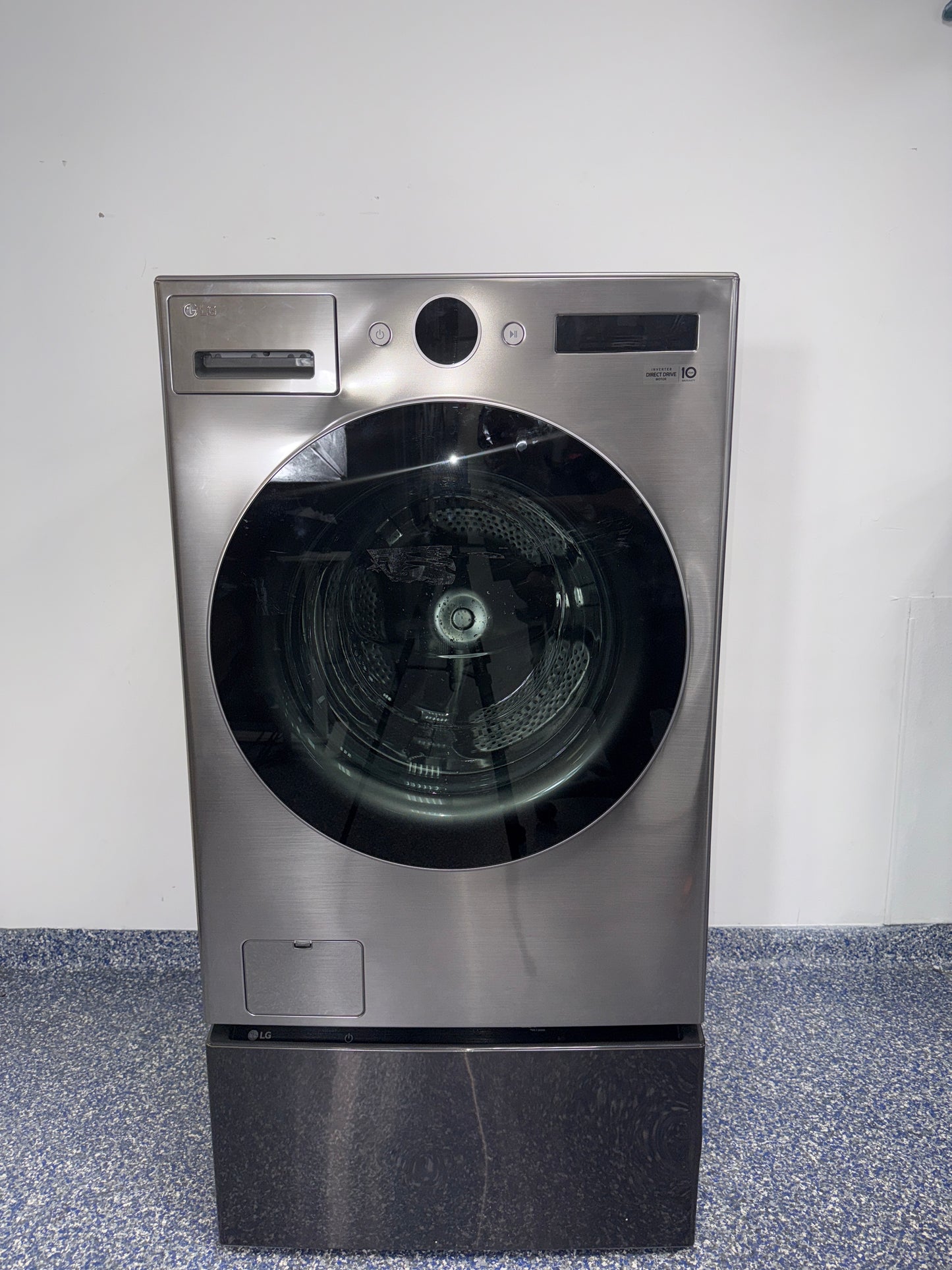 The LG WM5500HVA front load washer from the front, highlighting its TurboWash™ 360° feature and a great deal in Kansas.