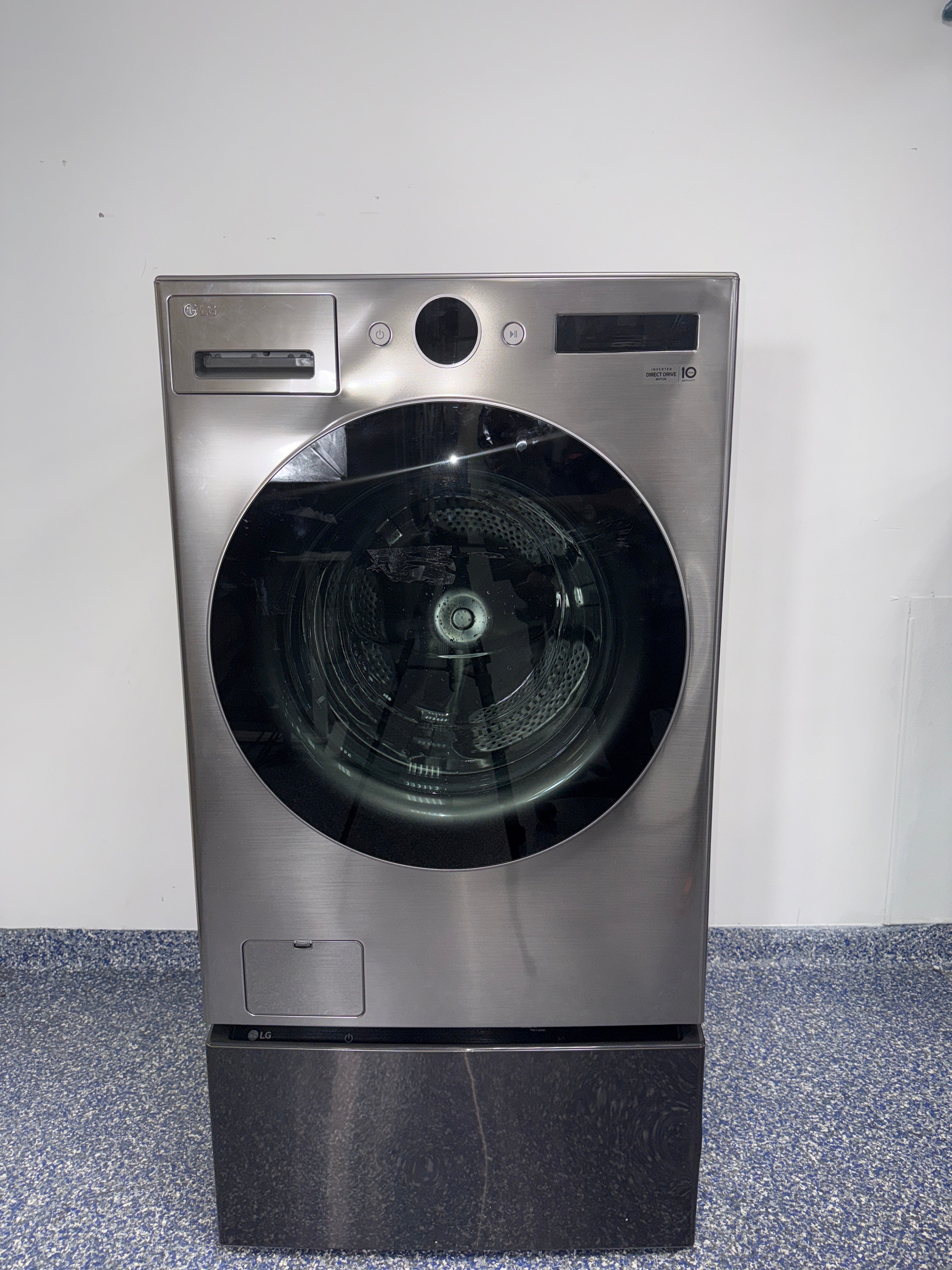 The LG WM5500HVA front load washer from the front, highlighting its TurboWash™ 360° feature and a great deal in Kansas.