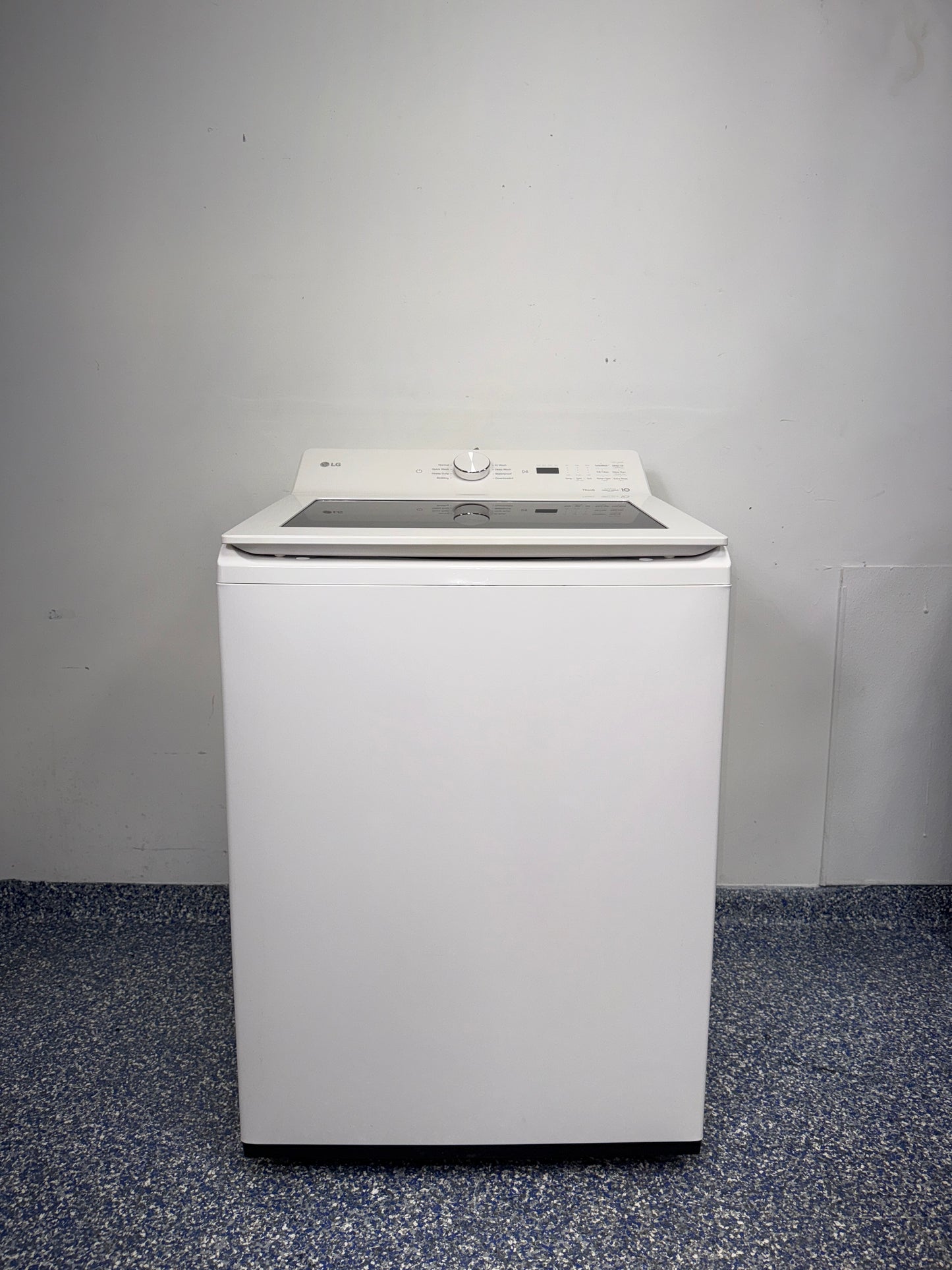 Front view of the LG WT8200CW 5.5 cu ft Top Load Washer in white. On sale at Appliance Shark - Scratch & Dent store | Kansas City.