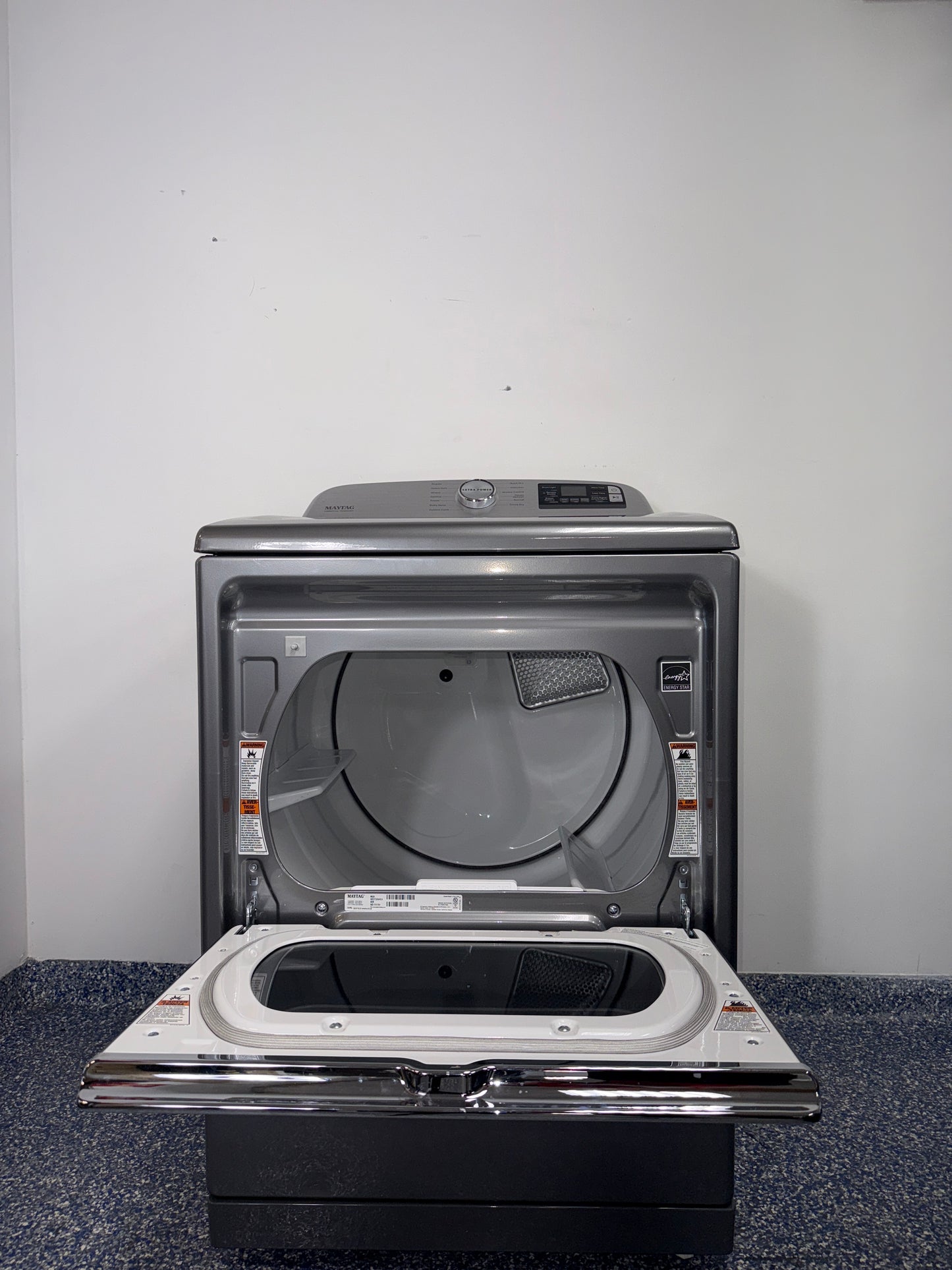 The interior of the MAYTAG MED7230HC dryer, showing the spacious drum and Sanitize Cycle option, for sale in Kansas.