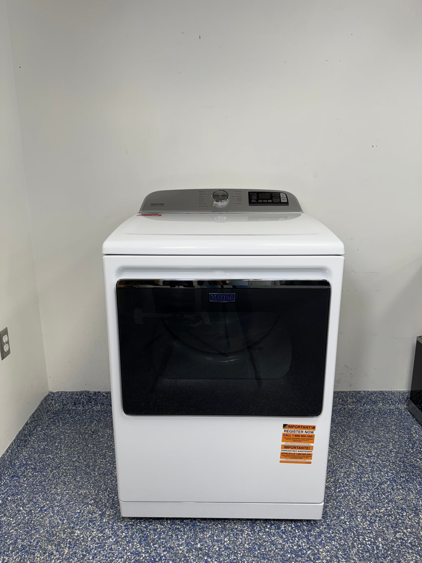 A full frontal image of the Maytag MED7230HW electric dryer, highlighting its clean white finish and control panel. On sale at Appliance Shark - Scratch & Dent store | Kansas City.