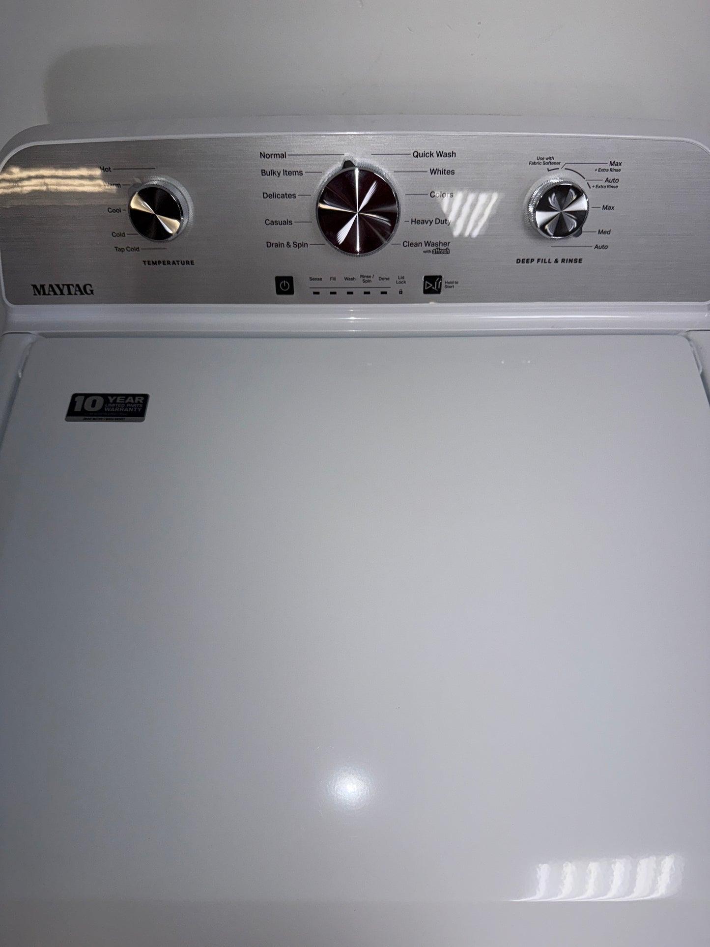 The MAYTAG MVW4505MW top load washer from the front, highlighting its Deep Fill and PowerWash Agitator features and a great deal in Kansas.