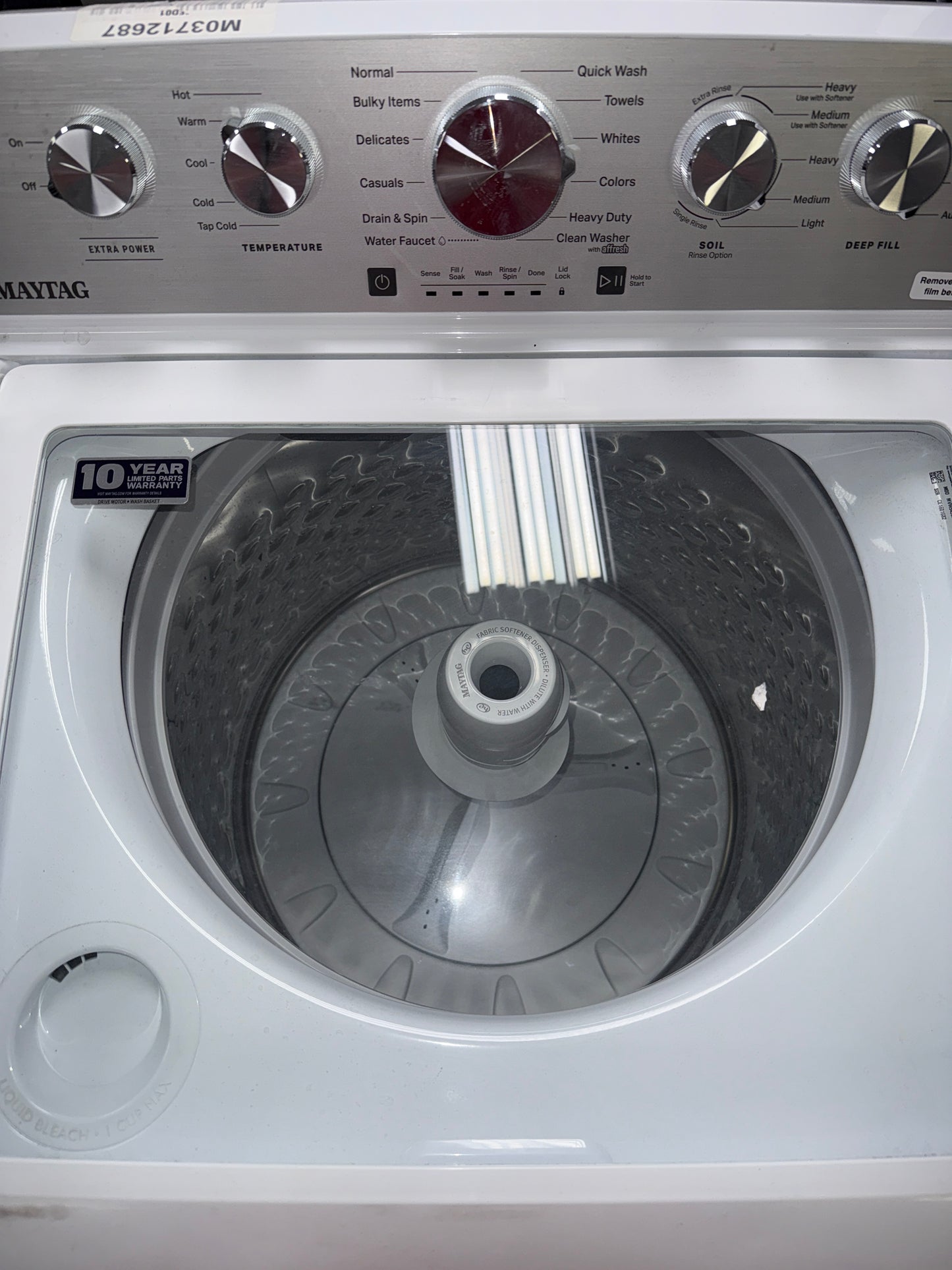 A close-up view of the top control panel on the MAYTAG MVW5435PW, for sale in Kansas.