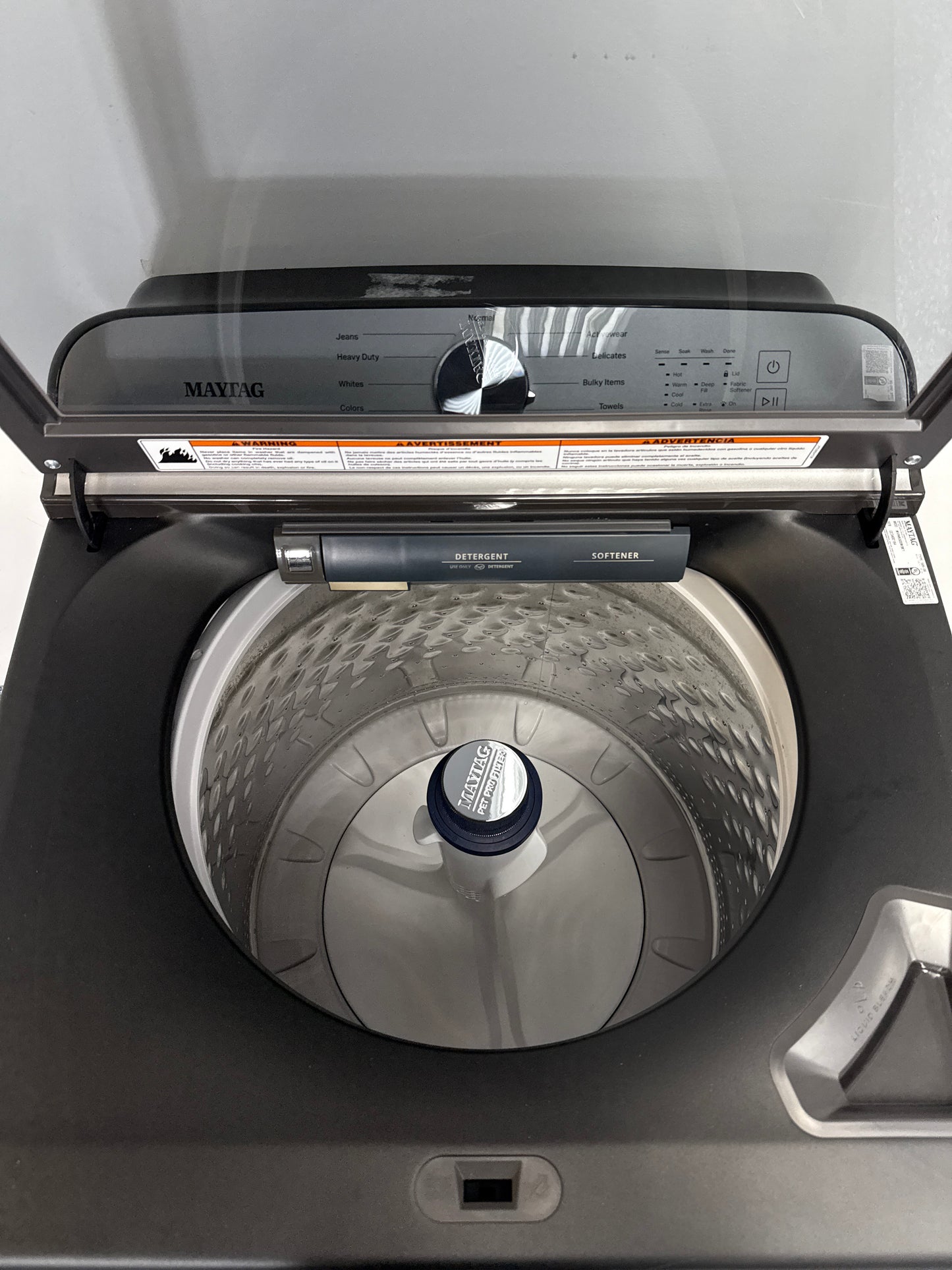 The MAYTAG MVW6500MBK top load washer from the front, highlighting its Extra Power button and a great deal in Kansas.