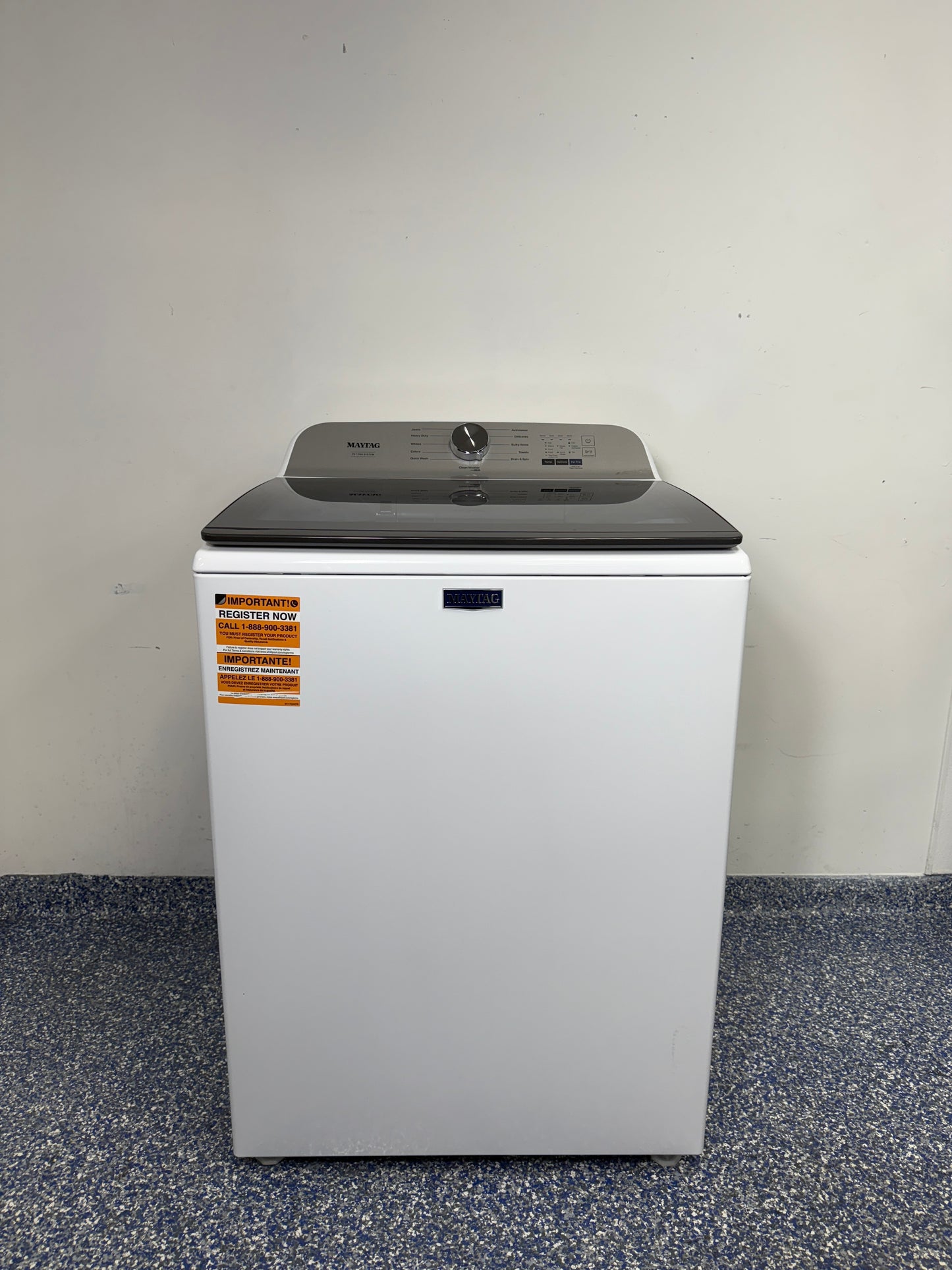 A full frontal image of the Maytag MVW6500MW top-load washing machine, highlighting its classic white finish and control panel. On sale at Appliance Shark - Scratch & Dent store | Kansas City.