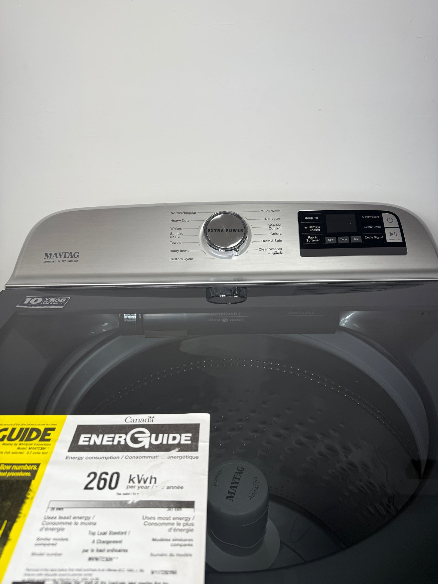 A detailed view of the digital control panel for the Maytag MVW7230HC, showing the various wash cycles and Extra Power button. On sale at Appliance Shark - Scratch & Dent store | Kansas City.