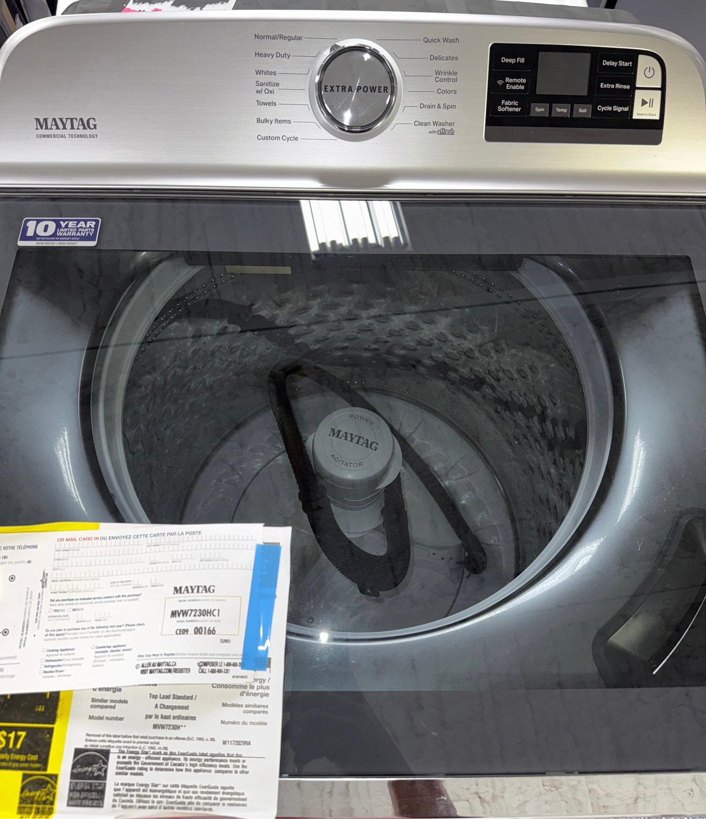 A close-up view of the control panel on the MAYTAG MVW7230HC washer, showcasing its Advanced Vibration Control, perfect for an Overland Park home.