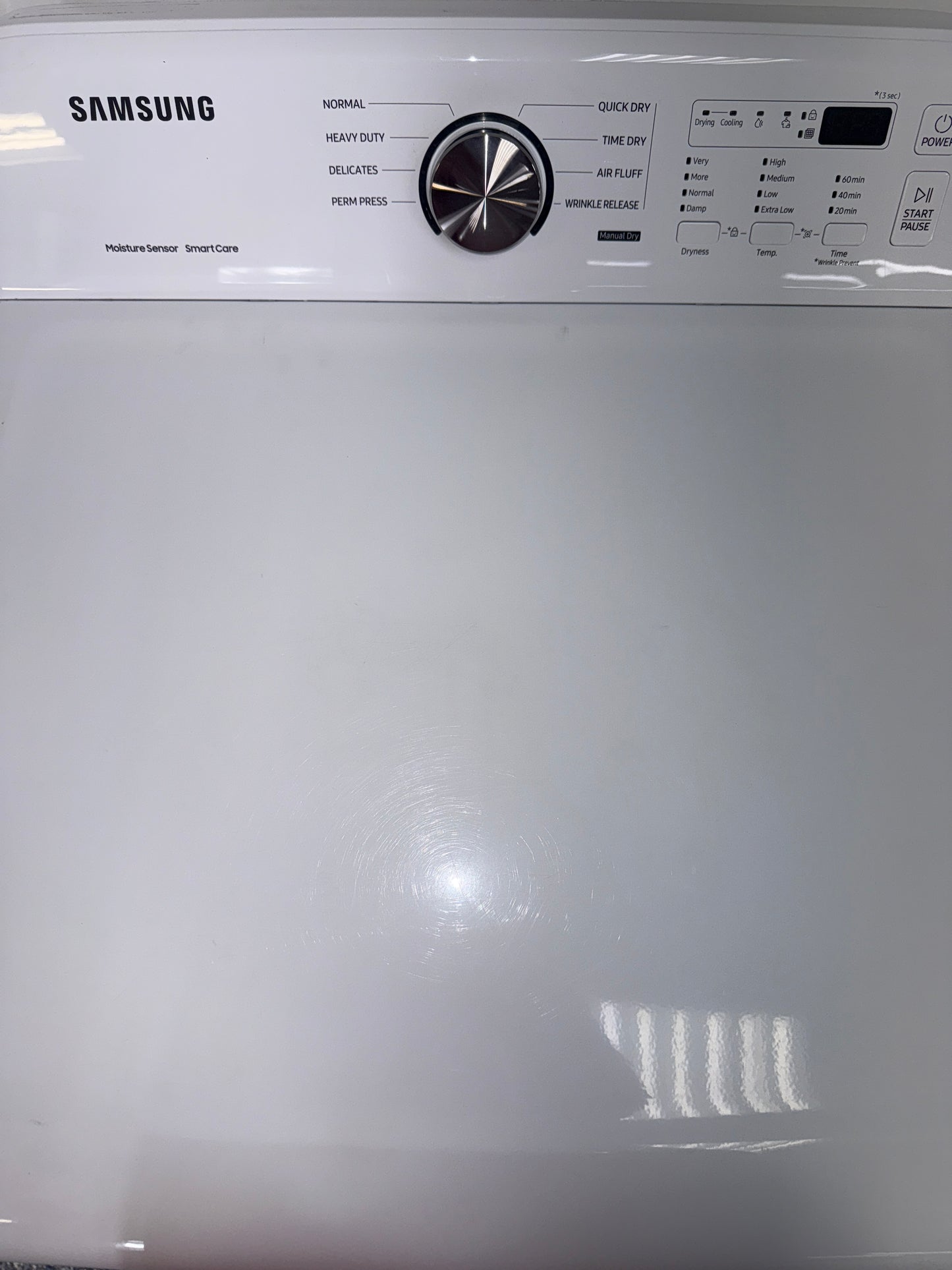 The interior of the SAMSUNG DVG45T3200W dryer, showcasing its 10 preset drying cycles, for sale in Kansas.