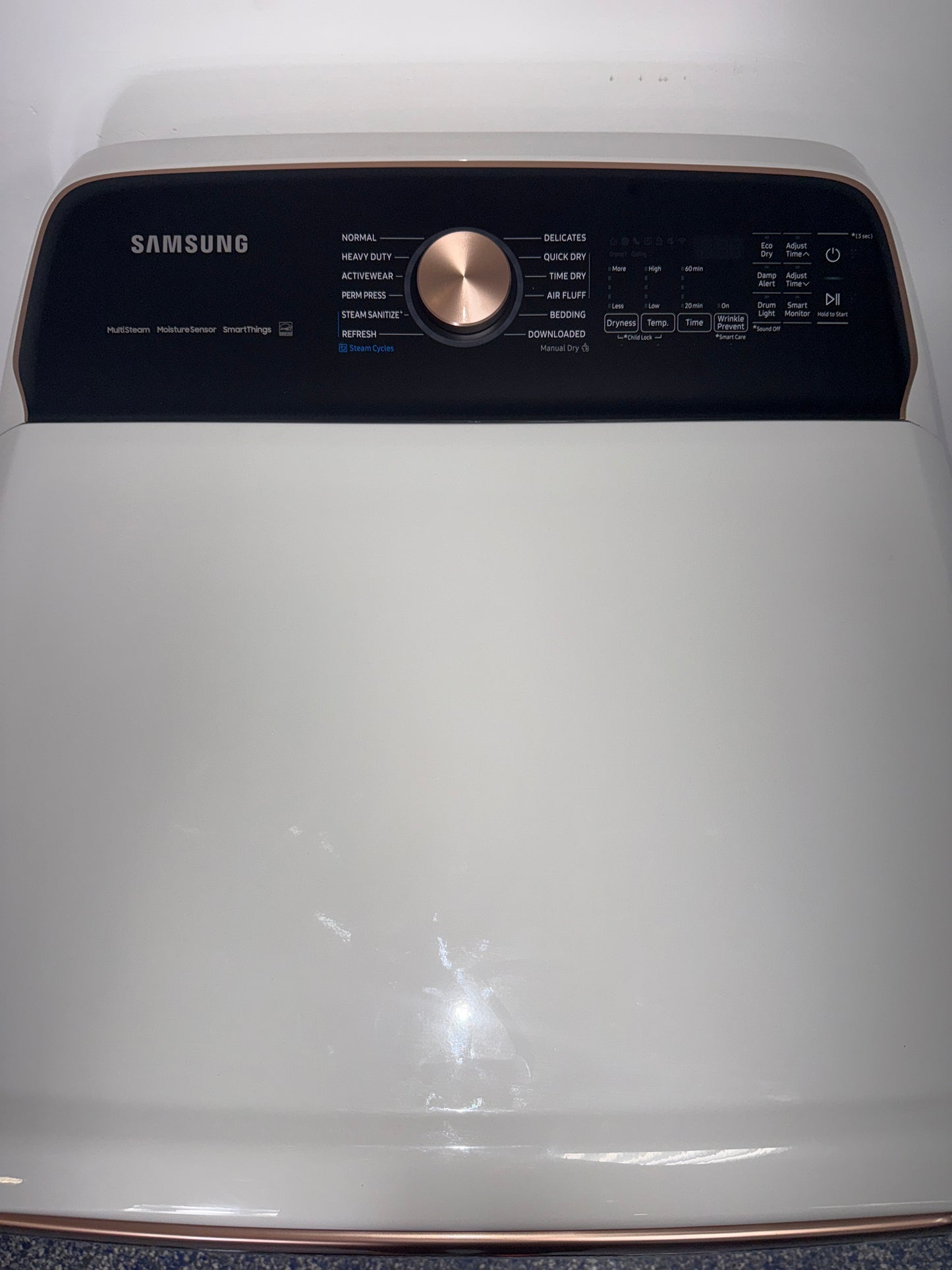 The SAMSUNG gas dryer, model DVG55CG7500E, featuring the Smart Dial, available at Appliance Shark.