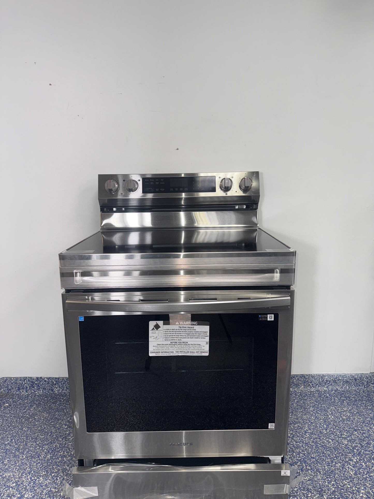 The SAMSUNG NE63D6711SR electric range from the front, highlighting its No-Preheat Air Fry mode and a great deal in Kansas.