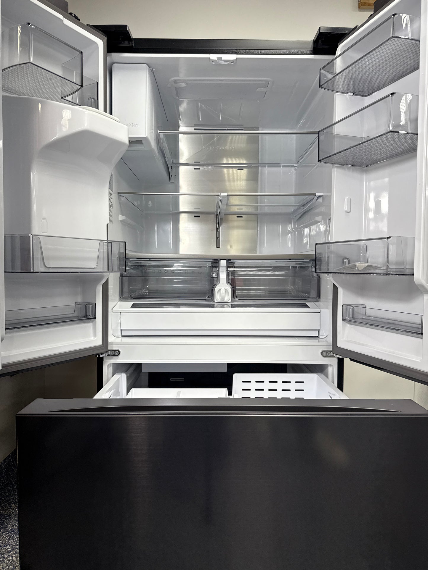 Scratch & dent SAMSUNG RF32CG5400MT refrigerator displayed at Appliance Shark in Overland Park with French door styling.