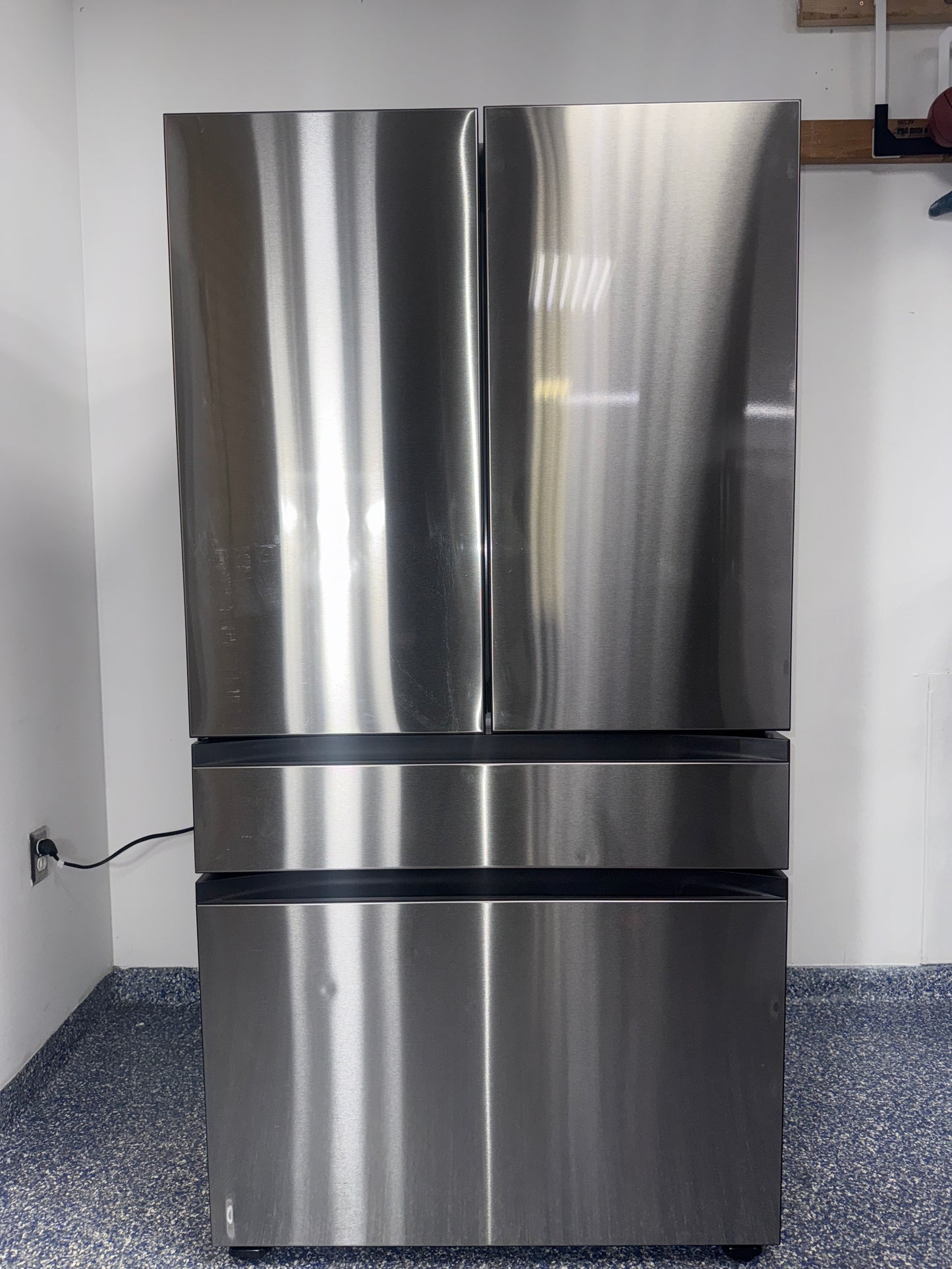 The SAMSUNG RF30BB6600QLAA refrigerator from the front, highlighting its concealed Beverage Centerâ„¢ and a great deal in Kansas.