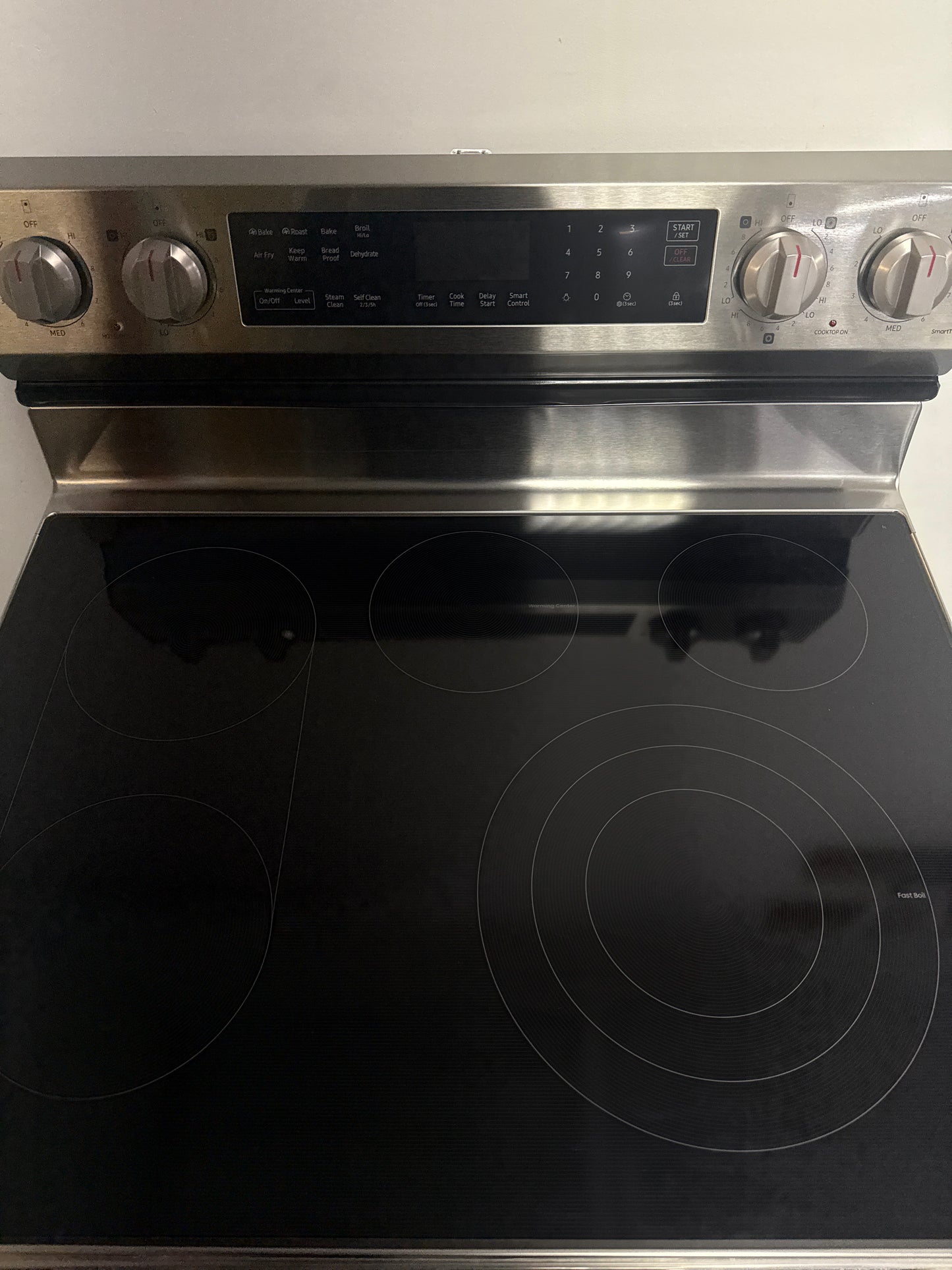The SAMSUNG 6.3 cu. ft. electric range, model NE63D6711SR, featuring Smart Technology, available at Appliance Shark.
