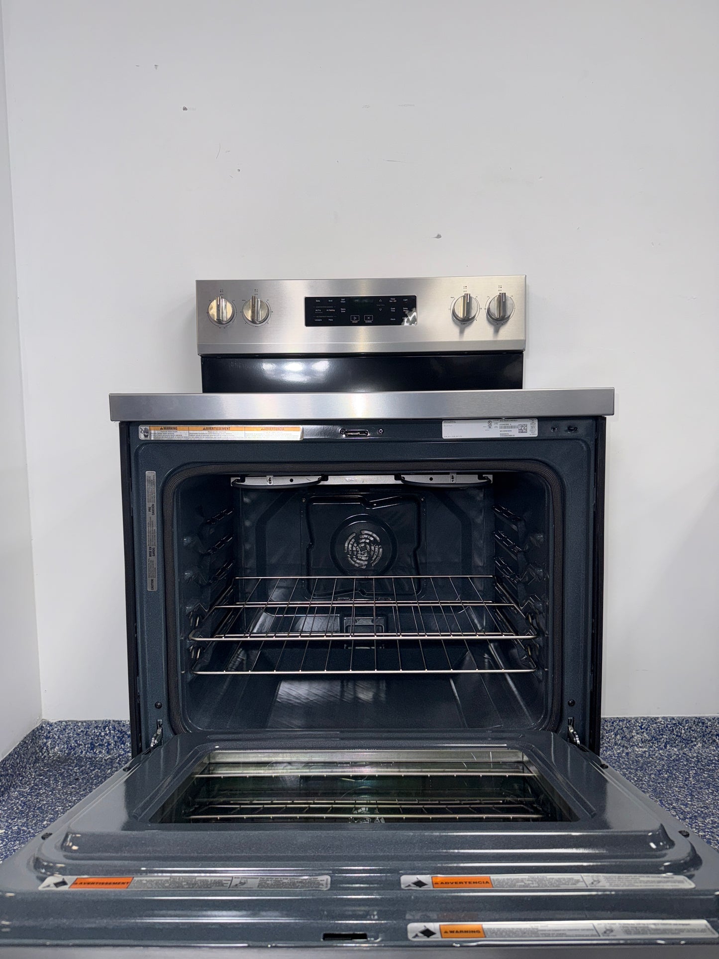 The WHIRLPOOL 5.3 cu. ft. electric range, model WFES5030RZ, available at Appliance Shark.