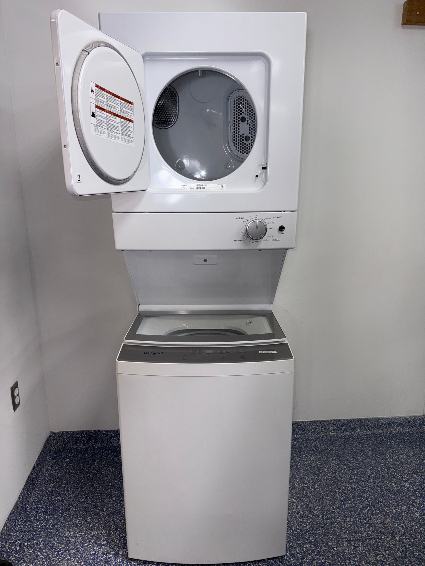 A close-up view of the control panel on the WHIRLPOOL WET4024HW, showing the AutoDryâ„¢ Drying System, perfect for an Overland Park, KS home.