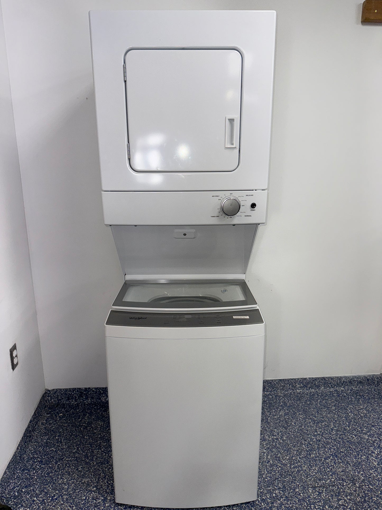 The WHIRLPOOL WET4024HW stacked laundry center from the front, highlighting its compact size and a great deal in Kansas.