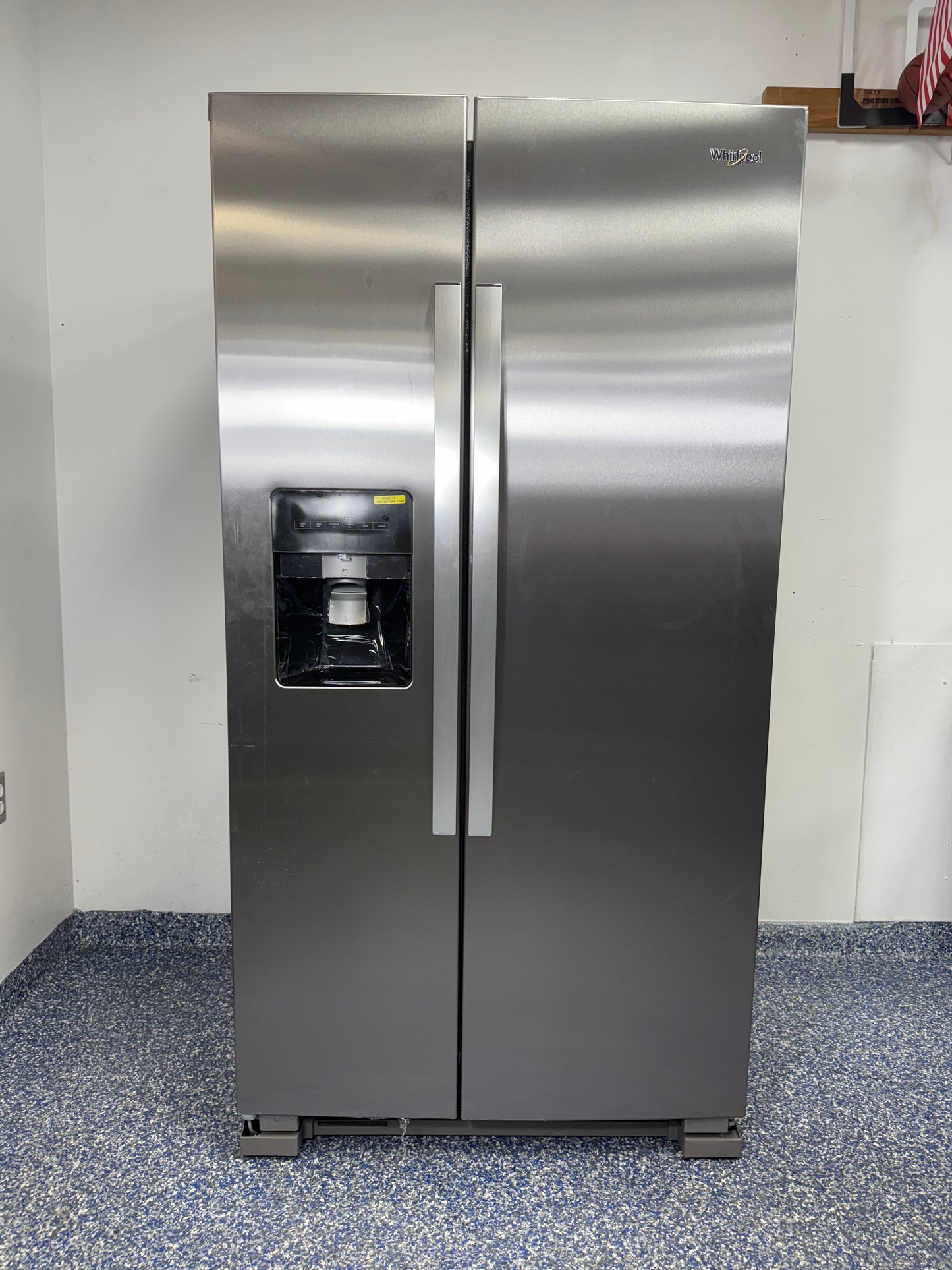 Front view of the Whirlpool WRS315SDHZ 20.5 cu ft Side-by-Side Refrigerator in stainless steel. On sale at Appliance Shark - Scratch & Dent store | Kansas City.