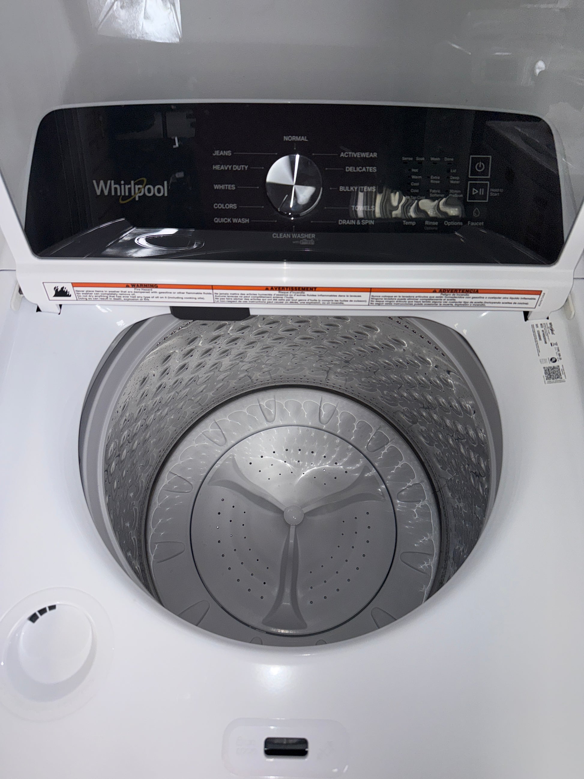A close-up view of the control panel on the WHIRLPOOL WTW5020SW, showing the Clean Washer with affresh® cycle, for sale in Kansas.