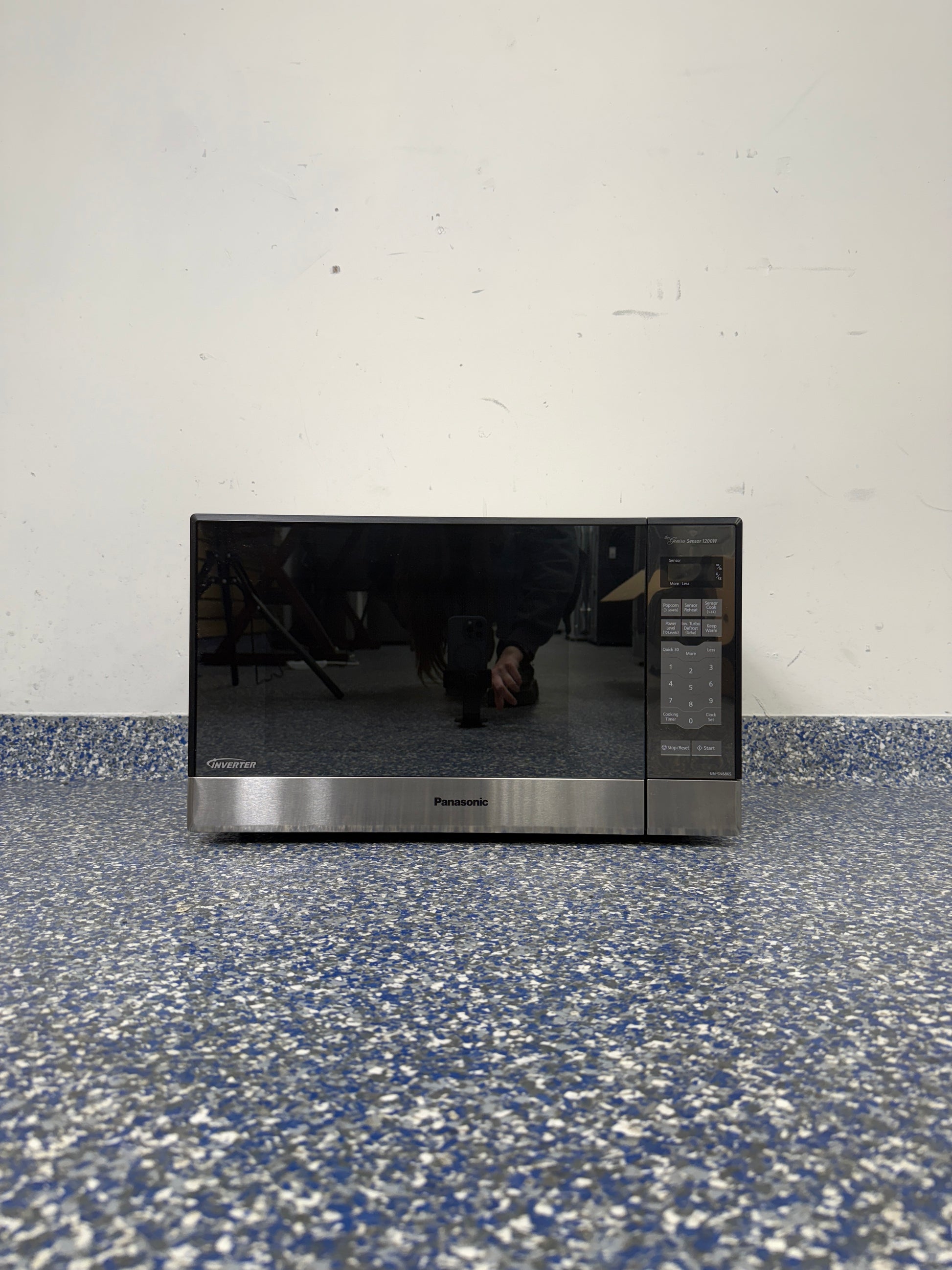 1.2 Cu.Ft PANASONIC Microwave with Fingerprint Resistant Stainless Steel Exterior and Black Frame at Appliance Shark Discount Appliance Store in Overland Park Kansas