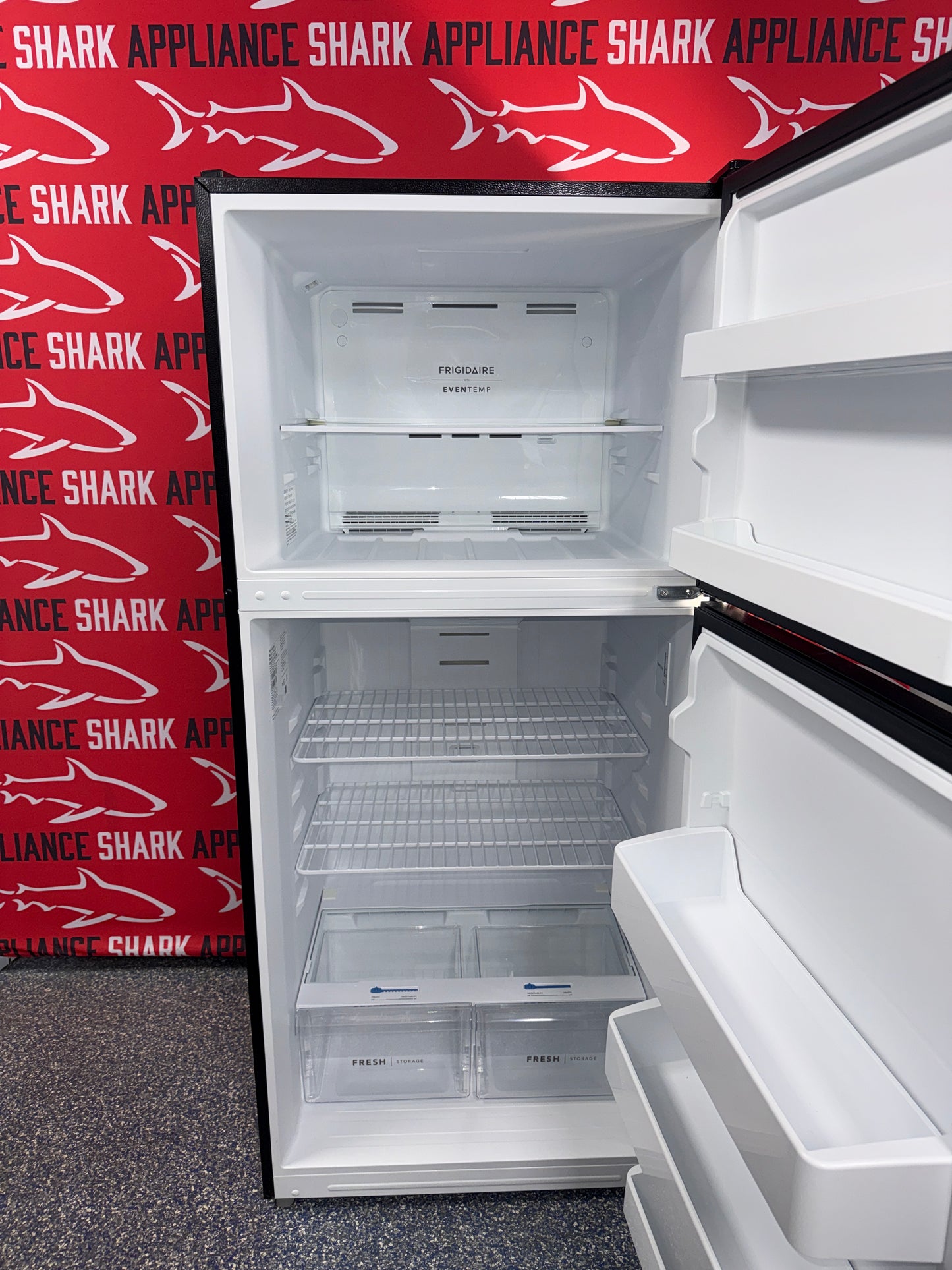 Scratch-dent Frigidaire top freezer refrigerator at Appliance Shark. Kansas City's best scratch-dent appliance store.