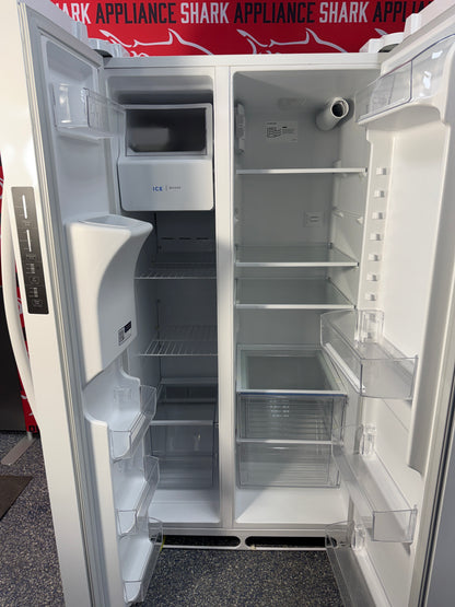 Scratch-dent FRIGIDAIRE side-by-side refrigerator at Appliance Shark. Kansas City's best appliance store.