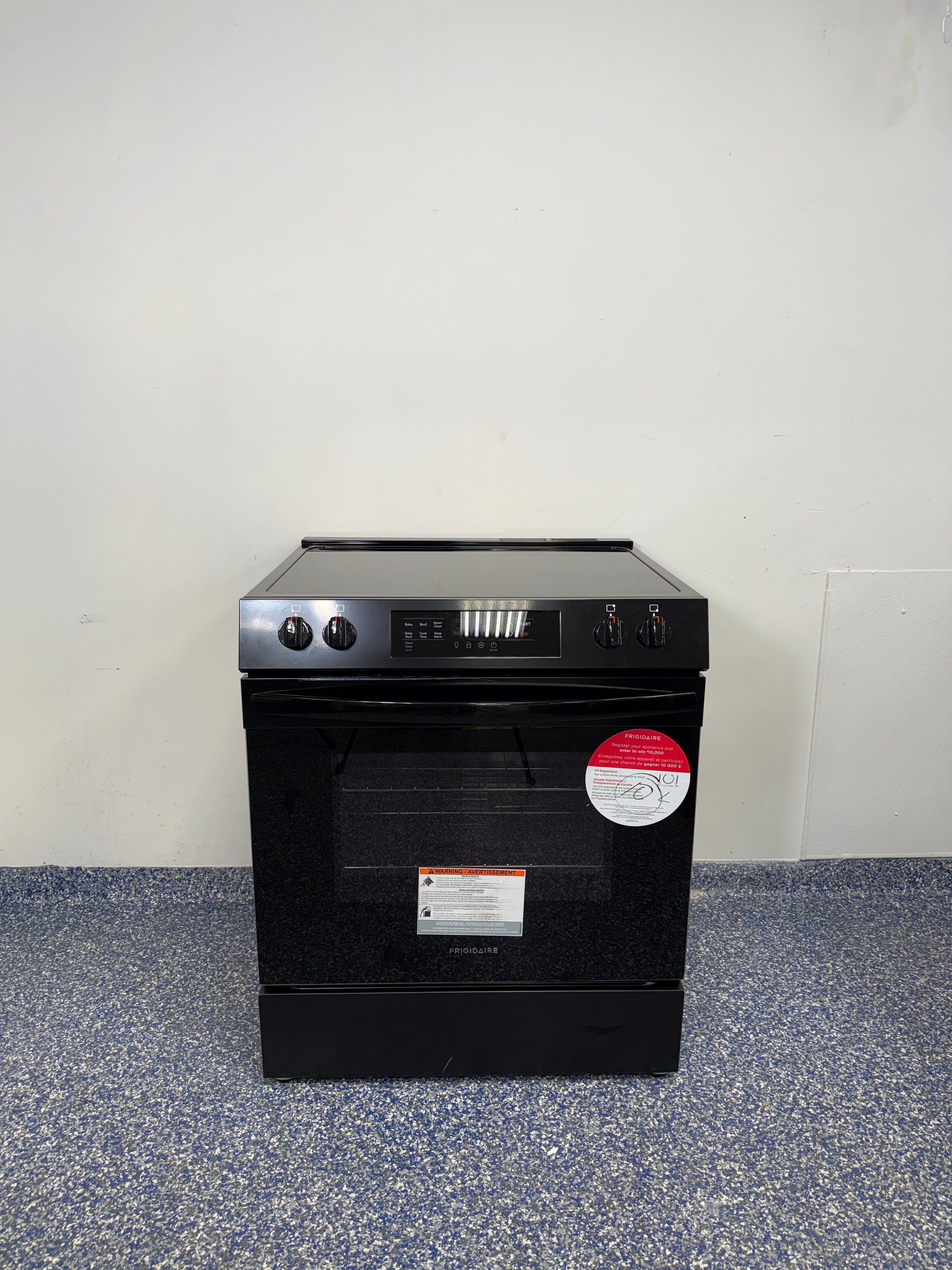 5.3 Cu.Ft. FRIGIDAIRE 5 Element Electric Range with Smooth Surface Glass Top, Extra-Large Oven Capacity, and Hidden Bake Element at Appliance Shark Discount Appliance Store in Kansas City Metro