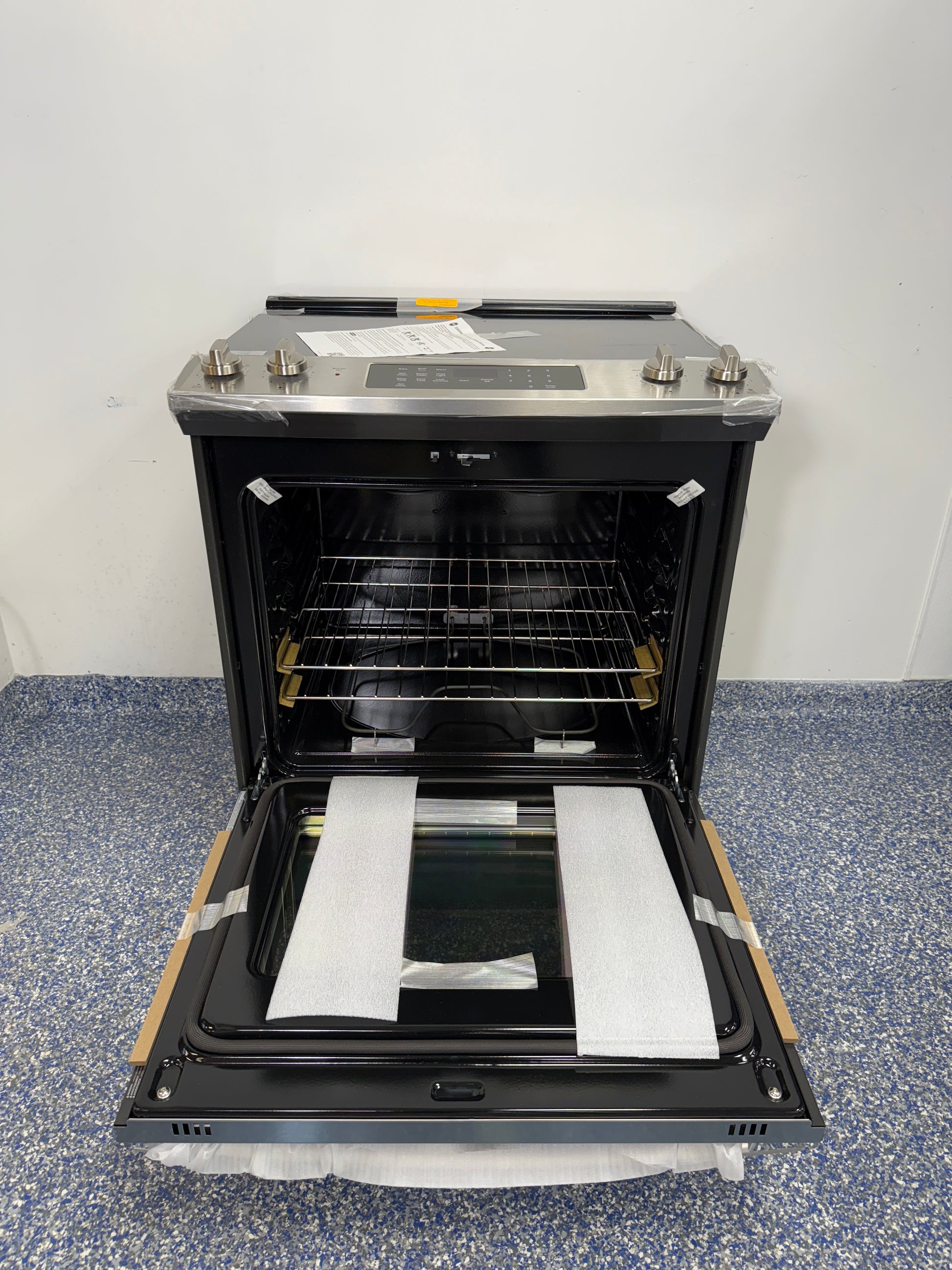 GE Slide-In Electric Range with Dual-Element Bake and a Smooth Cooktop at the Best Scratch and Dent Discount Appliance Store in the Kansas City Metro