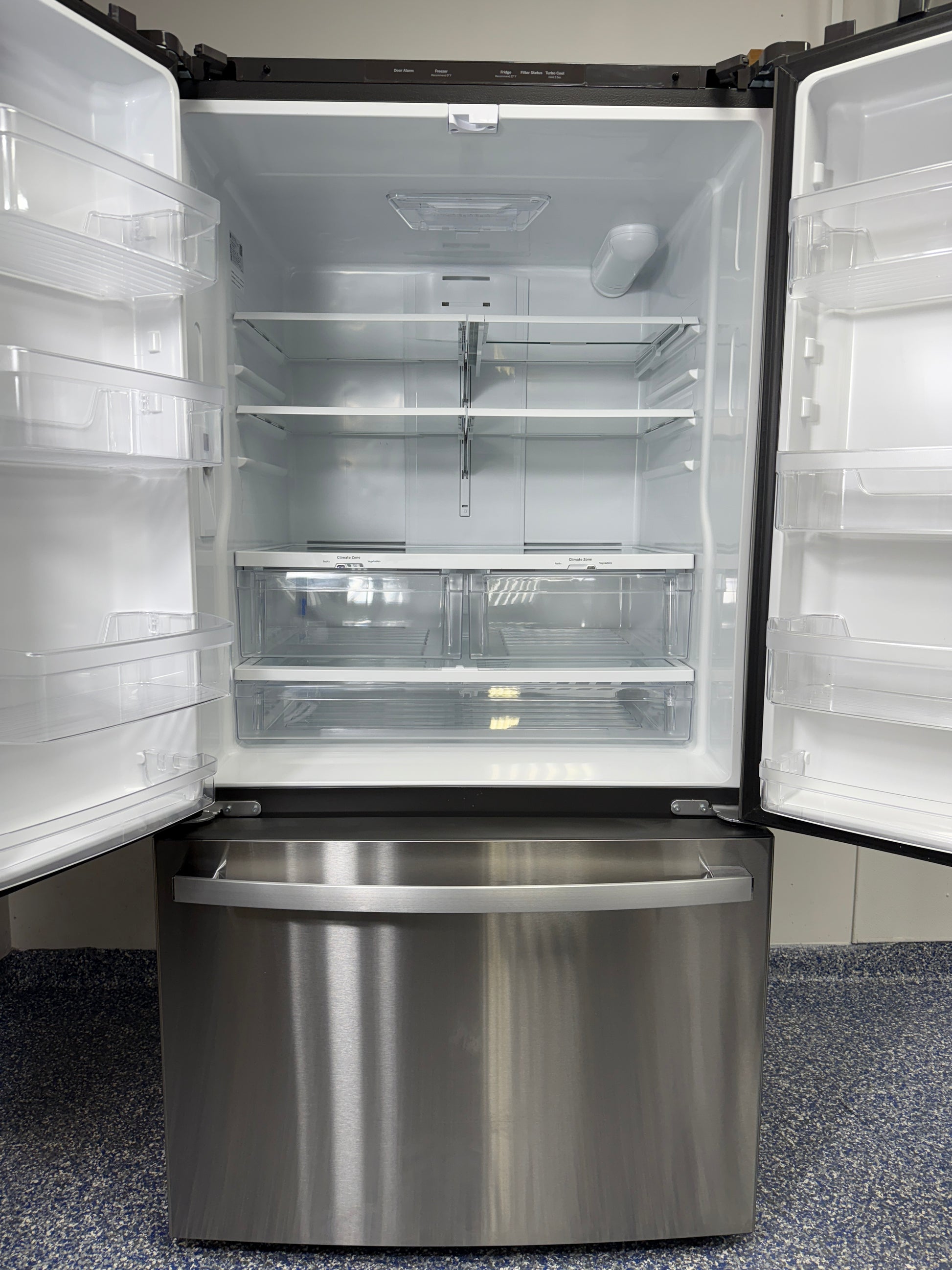 GNE27JYMXFS | 27.0 Cu.Ft. GE French Door Refrigerator with Glass Shelves, a Quick Space Shelf for Large and Tall Items, and Internal Water Dispenser at the Best Discount Appliance Store in KC Area