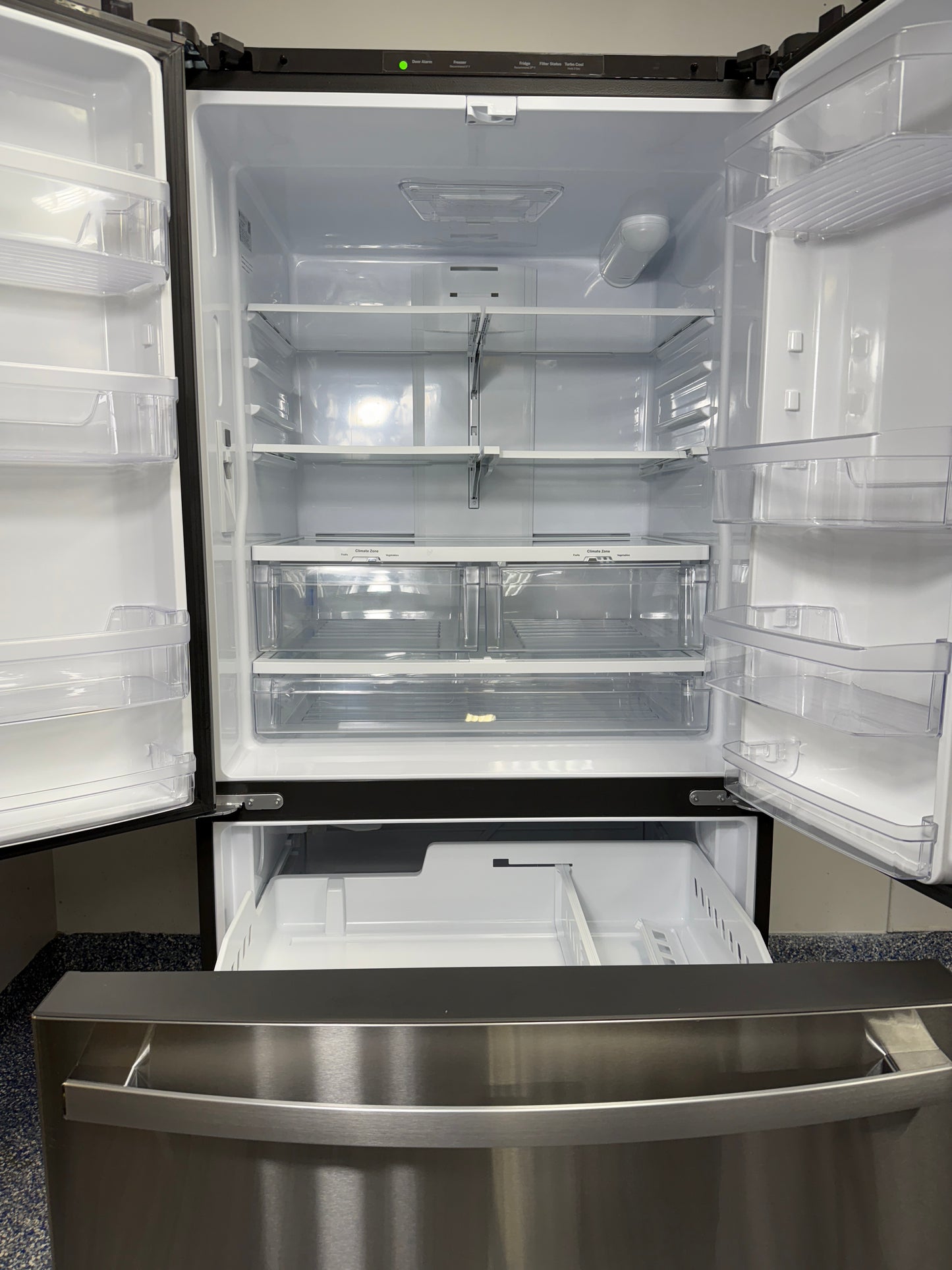 GNE27JYMXFS | 27.0 Cu.Ft. GE French Door Refrigerator with Internal Water Dispenser and Icemaker with Water Filtration System, LED Interior Lighting, and Glass Shelves at Appliance Shark Discount Store in Overland Park, Kansas