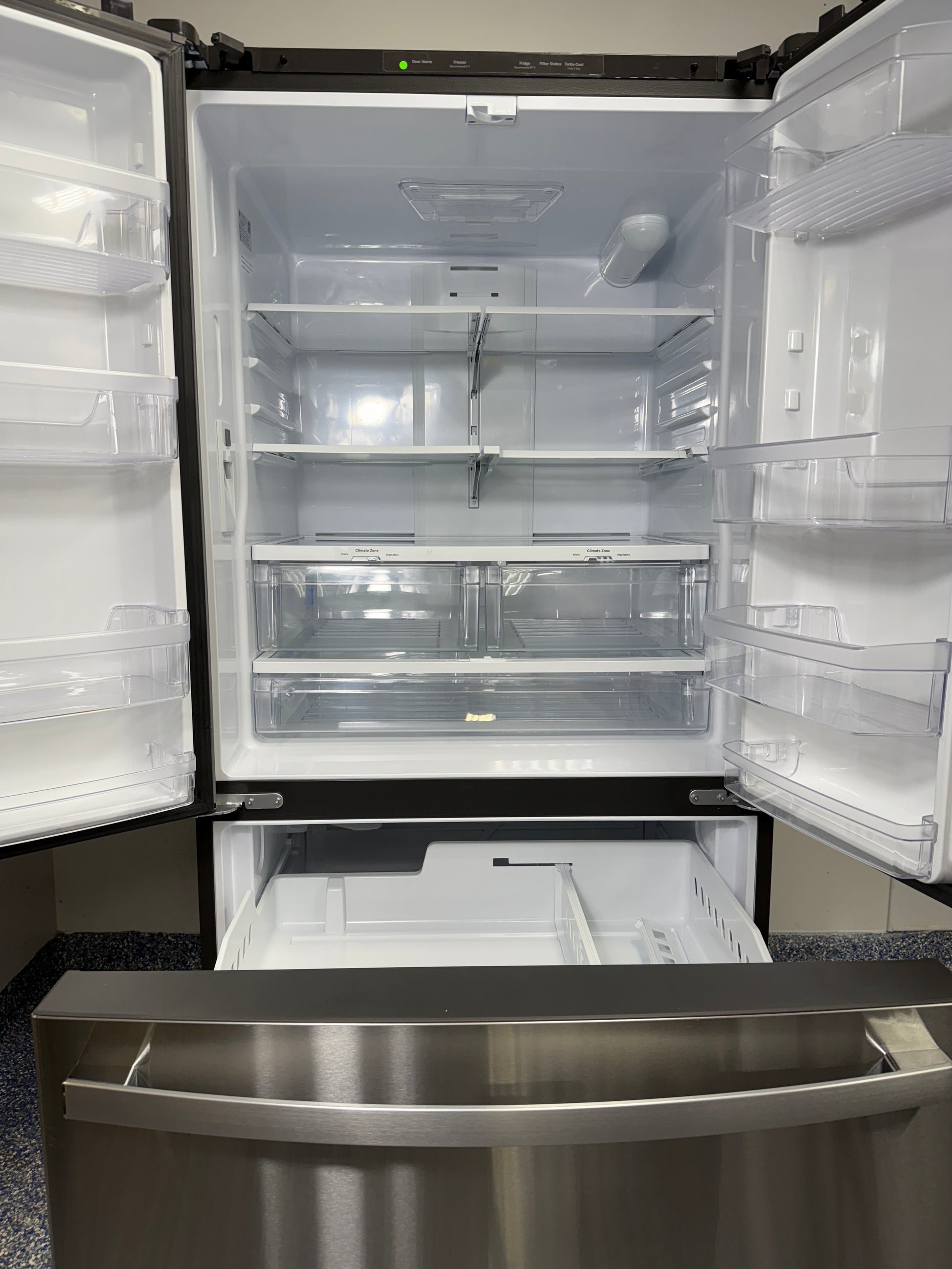 GNE27JYMXFS | 27.0 Cu.Ft. GE French Door Refrigerator with Internal Water Dispenser and Icemaker with Water Filtration System, LED Interior Lighting, and Glass Shelves at Appliance Shark Discount Store in Overland Park, Kansas