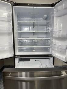 GNE27JYMXFS | 27.0 Cu.Ft. GE French Door Refrigerator with Internal Water Dispenser and Icemaker with Water Filtration System, LED Interior Lighting, and Glass Shelves at Appliance Shark Discount Store in Overland Park, Kansas