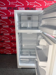 Discounted GE refrigerator with gallon door storage at Appliance Shark, Kansas City's trusted scratch-dent store.
