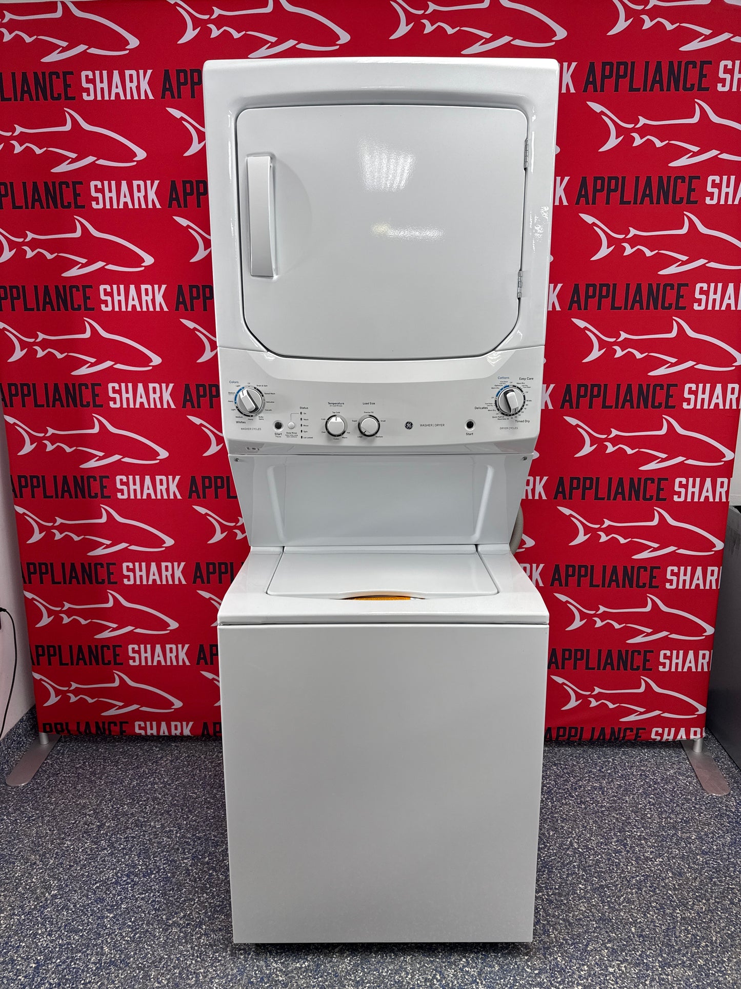 Scratch-dent GE electric stacked laundry center at Appliance Shark. Kansas City’s best appliance store.